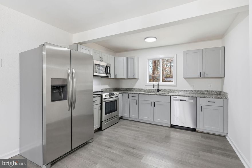 Renovated and move-in ready, single-family Colonial style offering flexibility, space, and convenience with no HOA. Situated on just under ½ acre in a well-established Spotsylvania community, this home delivers easy access to I-95, Route 1, Courthouse Road, and Spotsylvania County Parkway, making commuting and daily errands effortless.

This 4-bedroom, 2 full bathroom home is thoughtfully designed for main-level living as an option and has been upgraded within the last few years. The main level features a comfortable living room, dining room, eat-in kitchen with new stainless steel appliances, a main-level bedroom, and a separate laundry room with washer and dryer. Whether you need single-level living, guest space, or added flexibility, the layout adapts easily to your lifestyle.

Upstairs, you’ll find three spacious bedrooms and a full bath, offering privacy and functionality for family or guests. The fully fenced rear yard provides room to relax, entertain, garden, or let pets roam freely.

This property is ideal for first-time buyers, those ready to move up from a townhome or condo, or anyone seeking more space and privacy without sacrificing convenience. The versatile main-level bedroom can serve as multi-generational living quarters, a private family room, additional living space, rental opportunity, or home office — the options are endless.

A rare combination of location, flexibility, and no HOA, this home is ready for immediate occupancy and offers exceptional value in Spotsylvania County. Don’t miss this opportunity.