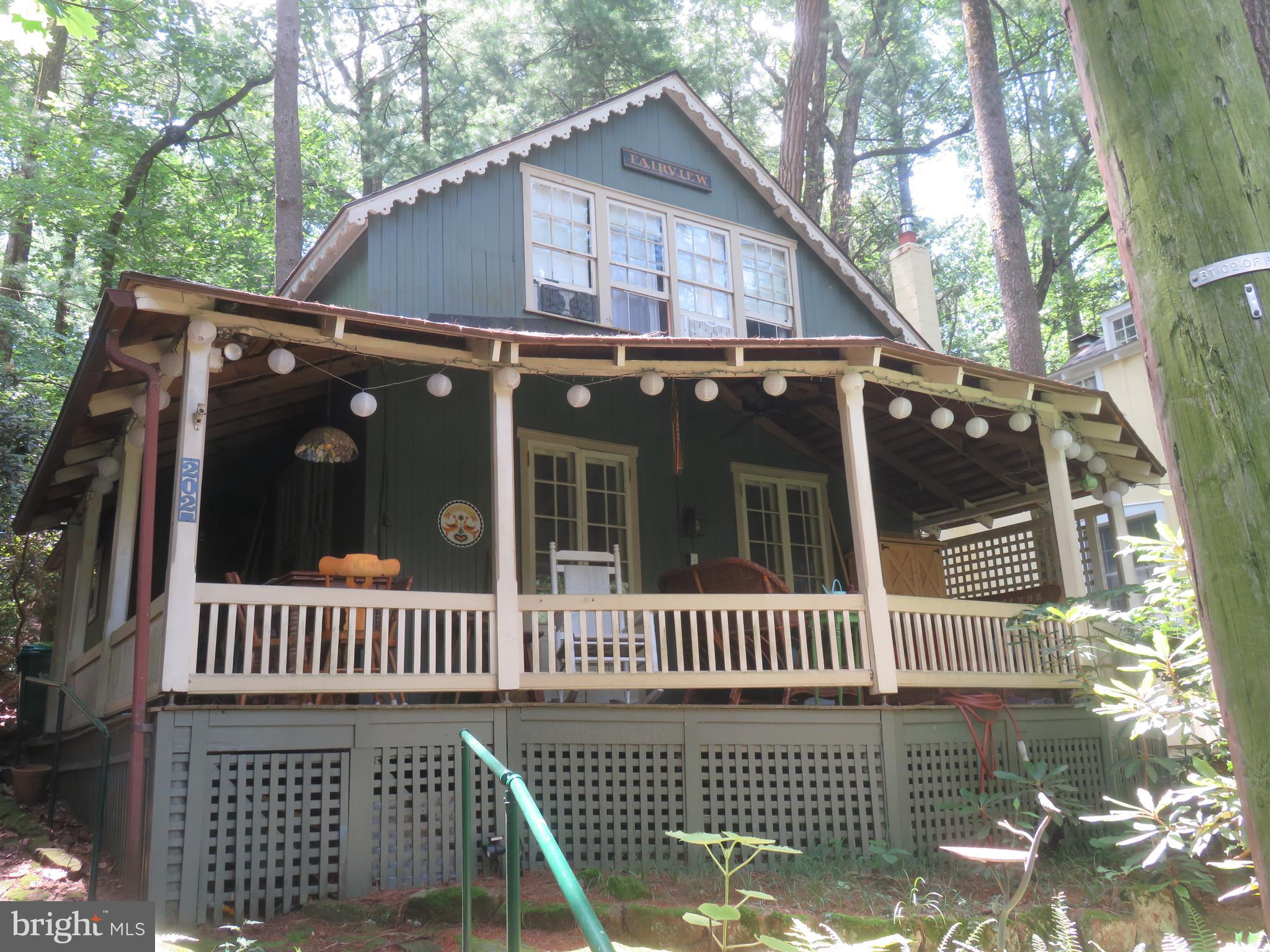 It's adorable! Unspoiled! Most affordable way to get into Chautauqua! And, 2nd lowest price of all 25 cottages that sold this year in all sections! Traditional Mt. Gretna seasonal cottage in desirable Chautauqua section directly behind the Mt. Gretna Playhouse 1 block from ice cream at the Jigger Shop. All furniture included.