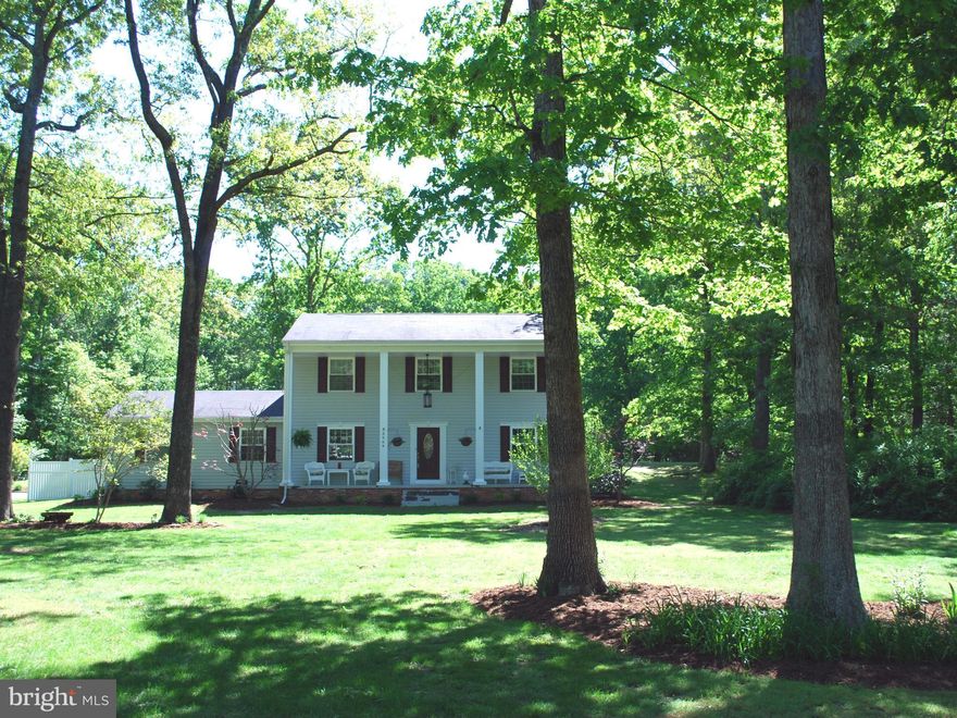 Beautiful Colonial with a huge detached garage/ workshop. Must see this 4 bedroom, 3 full bath home, w/ large yard and patio for entertaining, attached car garage, separate dining room, large family room with wood burning stove, separate mud room/laundry room, plenty of storage and nice size bedrooms. Detach garage offers space for cars, workshop or both!