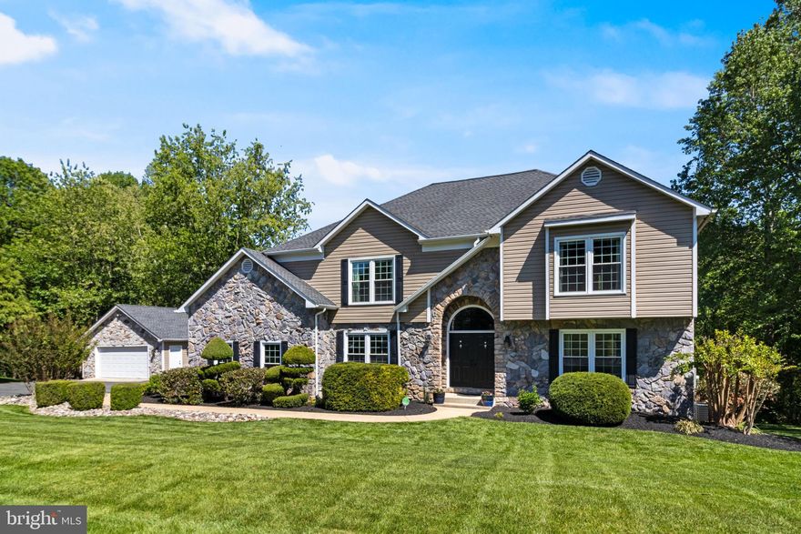 Open House: Saturday, May 2nd 2pm-4pm. Gorgeous Colonial located in the sought‑after Berry Hill Manor community, offering exceptional space, modern updates, and a premier setting on .55 of an acre. This 6‑bedroom, 5‑bath residence is designed for comfort, versatility, and multi‑generational living with a fully finished walkout basement, secondary kitchen, and private bedroom suite. The main level features a beautifully renovated kitchen with new counters, custom cabinetry, and a built‑in bar area, along with a convenient main‑level bedroom and full bath. The upper level includes four generous bedrooms and three full baths, including a spacious primary suite with abundant natural light, walk‑in closet, jacuzzi tub, glass shower, and updated cabinetry with quartz counters. The lower level provides a large recreation area, bedroom, full bath, and access to the outdoor oasis. Enjoy an in‑ground pool with three‑tier decking, a walkout patio, and ample space for relaxation and entertaining. Recent Updates Include:  80‑gallon water heater (2022), kitchen renovation + new refrigerator (2022), basement stove (2022), basement bedroom remodel (2022), garage workbench (2022), heat pump (2023), updated pantry (2023), lower‑level heat pump (2024), washer/dryer (2025), and fire pit (2023). Ideally located minutes from major commuter routes (210/95/495), National Harbor, Joint Base Andrews, Indian Head Naval Base, and Patuxent Naval facilities. Convenient access to shopping, dining, entertainment, Old Town Alexandria, and Washington, D.C. RARE OPPURTUNITY : 2.625% assumable loan on the table for qualified buyers