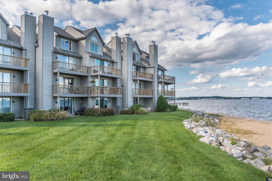 Luxurious Townhome Amazing Price and  Grand Stunning water views of the Chesapeake Bay and Bay Bridge on the horizon.  Easy approach to Annapolis Harbor and Naval Academy by boat via Severn River. Home features 4 levels of breathtaking views with a newly installed state of the art elevator for easy access. Updated all-white gourmet kitchen with brand new Corian countertops. Completely remodeled large master bathroom with dual walk-in showers and double vanities. All the bedrooms have been updated to include custom cabinetry, solid wood doors and crown molding.  2,300 finished sq. feet, one car garage and workshop. This beach setting in the gated community offers amenities that makes you feel as if you are away on vacation. You will never want to leave! Two pools, four tennis courts, jogging and walking paths, piers, kayak launch, marina, beaches as well as Sam's Waterfront restaurant with its very own tiki bar. Minutes to Downtown Annapolis and a short boat ride down ego alley. Easy commute into Baltimore and Washington, DC.