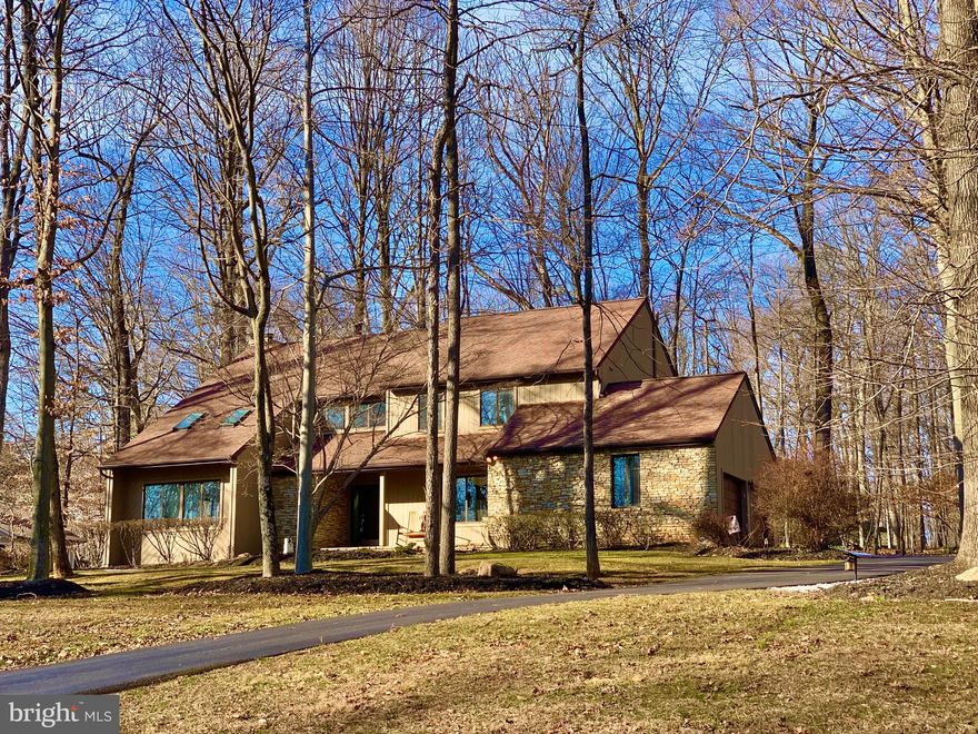 Welcome to 2308 Shaded Brook Dr surrounded by a  beautiful wooded landscape.   This contemporary three-level home is over  3000 sq ft of living space that includes 4 bedrooms & 2.5 baths , 2 car garage and  a 2 story foyer bringing in  tons  of  natural light.   RECENT UPGRADES INCLUDE A NEW HVAC SYSTEM INSTALLED IN 2020  AND NEW BATHROOMS in 2017.  Enjoy a   high-end beautiful  SPA like Master Bathroom   that includes  stunning white Calacatta porcelain tile with a rectangle soaking tub, a  stand-up shower with a frameless glass door and a bench.  Also includes a double  vanity with tons of storage and a separate make-up  counter.  The Master Bedroom also includes a separate  office/den .  The Spa like  hallway bathroom  also includes stunning white Calacatta porcelain tile with a double  vanity  including a  bathtub with  a partial frameless  glass door.  The OPEN KITCHEN  offers a 8 foot center island,  granite counters,  GE PROFILE stainless steel appliances including a double wall oven, desk,  garden window and 2 pantries.  Please  notice  the Gorgeous Slate Tile in the foyer and kitchen in a beautiful herringbone pattern.   Enjoy a  wood burning stone fireplace with a heatilator,  skylights,  solid core doors and an abundance of windows throughout.  No thru streets in this quiet neighborhood.  Unfinished basement with almost 1500 sq ft of space.   More highlights  include vaulted ceilings in the Formal Living Room,   dimming switches on most of the lights,  a covered front porch,  backyard patio , and  a Washer & Dryer  Mudroom behind  the kitchen by the garage.  Roof  Replaced 10 years ago.  Many upgrades through  out this beautiful home.