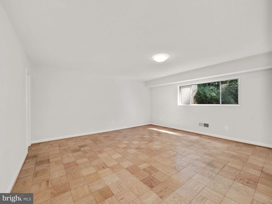 Get ready to be Wow'ed!  One of the largest 2 bedroom/2 full bath units in the lovely community of Parkside is completely renovated and ready for the lucky new tenants!  Boasting an open floor plan with refinished parquet floors, this home shines with plenty of natural light and upgrades throughout!    The brand new kitchen remodel features gleaming 42 inch white wood cabinets, high quality quartz countertops, and stainless steel appliances with gas cooking!  Both bathrooms were remodeled with high quality materials too.   A  new HVAC unit was installed in June.  Walk-out to your private patio with a serene wooded views..  The Parkside community is located on acres of property, conveniently located within minutes of Grosvenor Metro Station and there is a Ride-On bus too.  Parkside features sidewalks, swimming pool, tennis courts, two clubhouses available for private parties and playground.  Community does not accept pets, and no smoking please.  All Utilities included in monthly rental fee. Laundry in building.