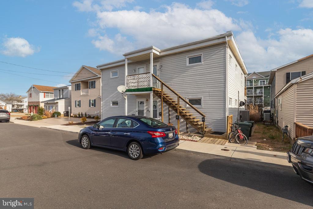 What a great place to take your boat and get out on the bay! 2 BRs, 1 Bath and all updated appliances and flooring. All Brand new furnishings. The unit is part of a 4 unit condo building. Owners can share the bulkhead and tie up at the pier, built by the owners. It's a nice getaway for you and kids , and the new furnishings . Only 4 blocks to the beach. So for the price of $350,000, you have a sweet place to enjoy the bay and beach areas. Very clean and ready for you to move in. Walking distance to downtown and all the amenities.