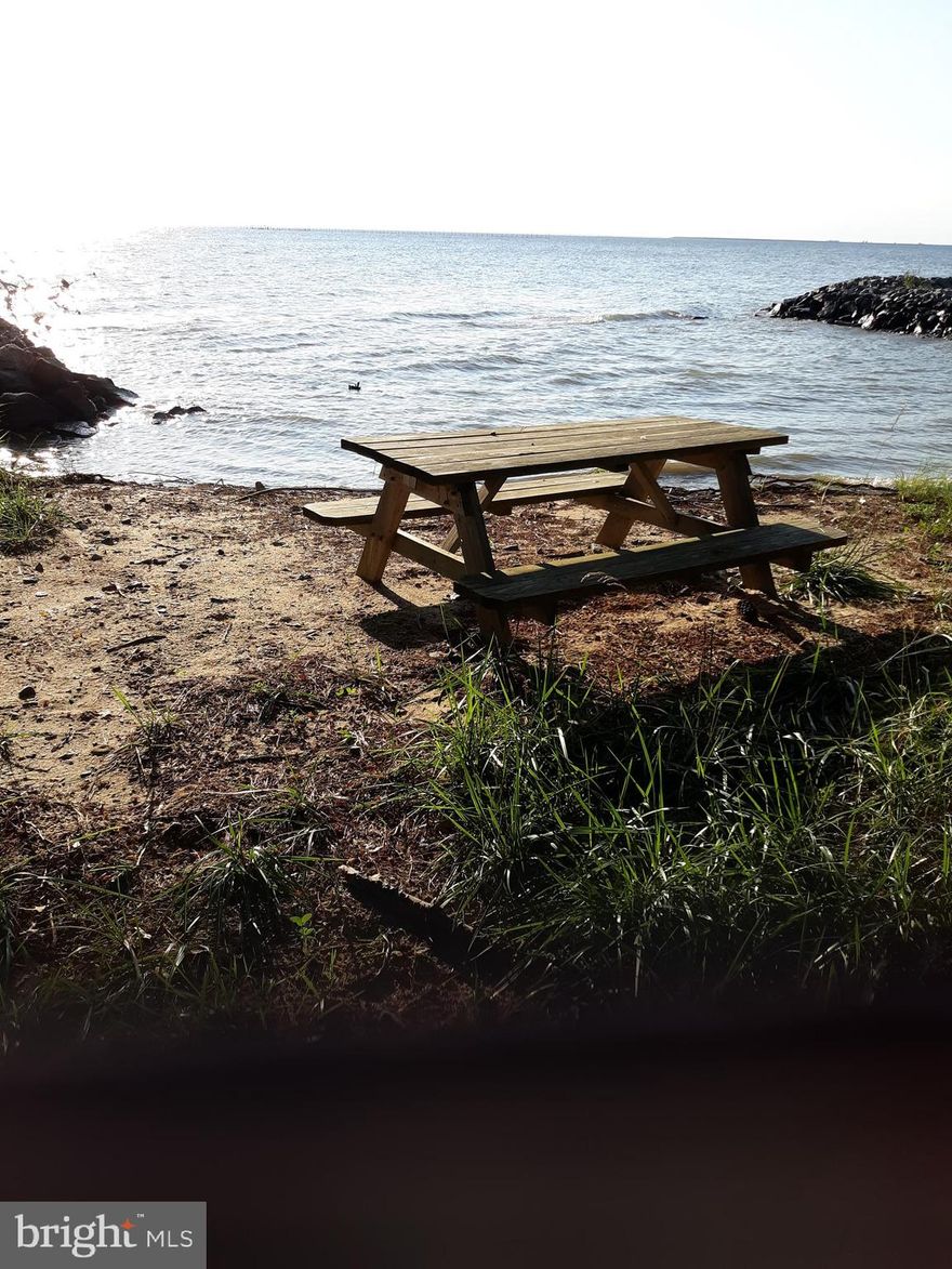 Tilghman Island. Clear level building lot with public sewer available. This lot offers just over an acre with water access right across the street. The perfect spot for your new vacation / retirement home. Culs-de-sac street offers peace and quite. Excellent opportunity to make your island dream come true.