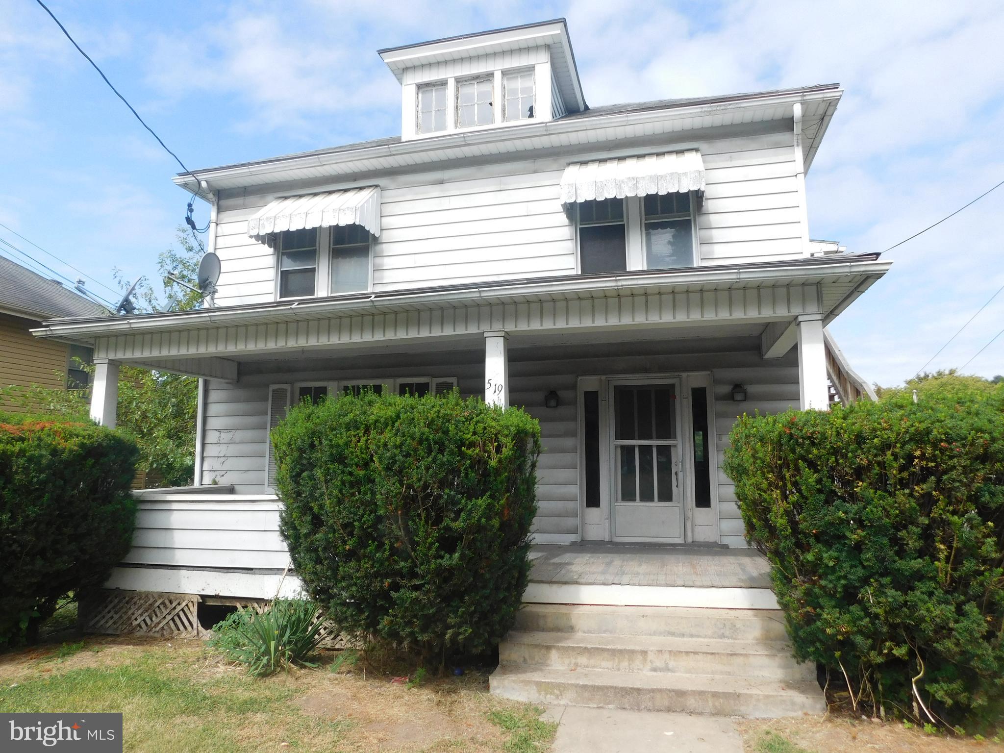 3 units and al full! good location; 4 car detached garage (needs a new roof)