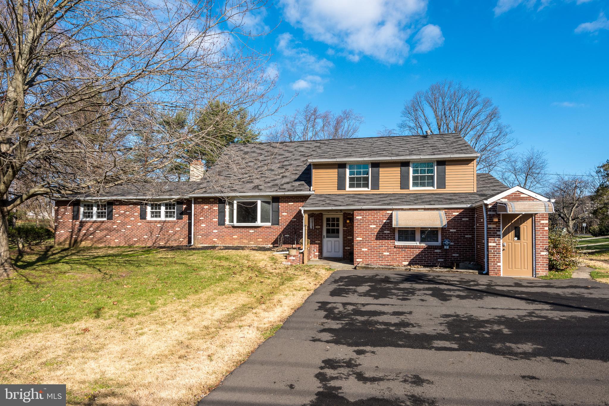 What an opportunity in Council Rock! This very large multi-level 5 bedroom, 2 full 2 half bath mixed use property has so much to offer including another parcel totaling over an acre of level ground. This home offers a huge living room, and dining with hardwood flooring on the main level along with a spacious kitchen with plenty of room for a large a gathering. A step down brings you to an enormous 25 x 20 family room with parquet flooring and stone wood burning fireplace, powder room and storage room. There are sliders leading to the 3 season porch offering additional living space. The second level enjoys a primary ensuite bedroom with updated bath. Two additional bedrooms, hall bathroom and linen closet complete this level. On the third level you will find 2 additional bedrooms as well as a finished room that is used as storage but could possibly be a bedroom, craft room, playroom – endless possibilities. The laundry is located a few steps off the kitchen which then leads to the connected office space. The 850 sq ft dental office has the main lobby and waiting area, two treatment rooms, another room with cabinetry and sink, an office and a handicap accessible half bath. The dental office does have a separate front entrance. Additional features and improvements of this property include: hardwood flooring throughout most of the home, roof replaced in 2009, siding replaced in 2017, replacement windows in 2013, tankless water heater 2018, gas cooking, parking for 12 cars, large shed, 4 zone gas heat. Parcel 31-059-061 also included with this sale. Property has excellent visibility set on the corner of Rt 232 (Second Street Pike).