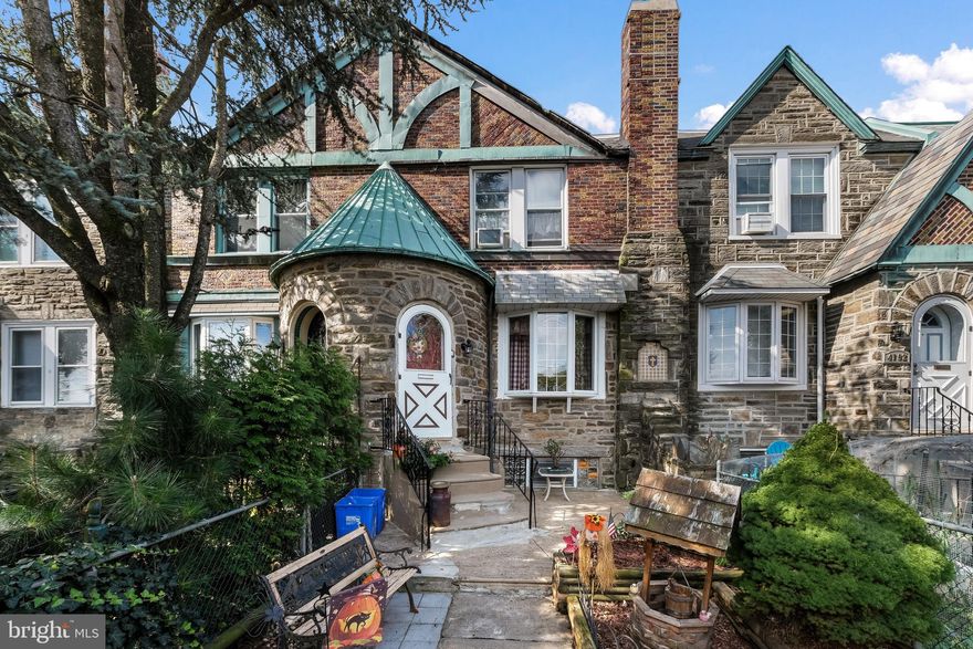 Welcome home to this massive 3 bedroom, 1.5 bath all stone straight-thru row home that sits in the heart of Northeast Phila. Step inside to the living room highlighted by an ornamental fireplace, and bow window overlooking the front yard.  Hardwood floors extends into the dining room with chair rail molding.  The oversized eat-in kitchen has oak cabinetry, built-in dishwasher, plenty of counter space and an exit to the rear deck. The second floor offers a spacious master bedroom suite with hardwood floors, and a private remodeled bathroom.  The two additional bedrooms are both a nice size with ample closet space, and a remodeled bright full hall bathroom. The lower level is huge and waiting to be finished and includes your laundry area.  Walk out the back of the home to find off street parking as well.  Close to all major highways and public transportation..