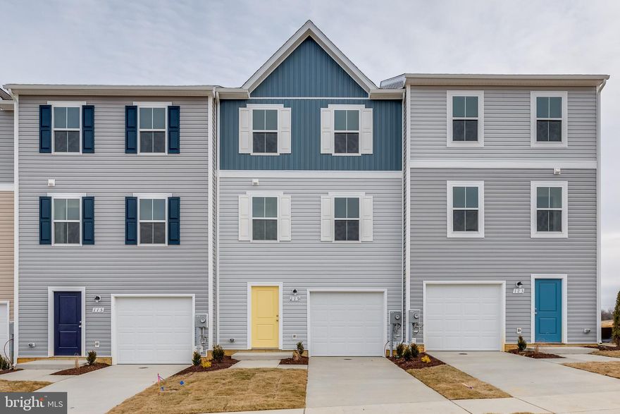 FOR RENT! Located in the community of Dillon Farm in Hedgesville, WV. This newly built townhome features 3 Bedrooms, 2.5 Baths. Perfect commuter location with easy access to Route 9 and I81. Highlight of this townhome includes an open concept floor plan between the living/kitchen/dining on the main level. Seamlessly entertain from the kitchen’s 10ft island that features stainless steel appliances, built in microwave and dishwasher. A generous sized trex deck provides additional bonus space for entertaining. Moving up to the third floor you will find the primary bedroom with walk in closet and private bath. Two additional bedrooms with full hall bath are also located in the upper level. The finished rec room could easily be used as a multi purpose space. Great as an office space or game/tv room. Gas community. Washer and dryer in unit. Applicant(s) must be able to pass credit/background check. Minimum 650 Credit Score. No Smoking. Security deposit and first month rent upfront. Call to schedule your private tour!