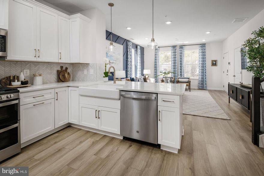 The most affordable new construction condo townhomes in Montgomery County! Welcome to the Avery—a spacious 2-level garage townhome condominium, now under construction in the heart of Montgomery Village. Offering 1,619 sq. ft. of beautifully designed living space, this home includes 3 bedrooms, 2.5 bathrooms, and an attached garage. The open-concept floorplan features a U-shaped kitchen with upgraded appliances, a primary suite with a tray ceiling, and a gorgeous spa-like bath with dual sinks. The secondary bath also features dual sinks, while abundant storage space throughout the home ensures functionality meets style. Set within Montgomery Village, residents enjoy access to an incredible array of resort-style amenities through the Montgomery Village Foundation, including: 6 community pools 18 tennis courts Volleyball, lacrosse, basketball & soccer courts Amphitheater & cricket field Dog parks & tot lots 330-acre park with lakes, walking & jogging trails All of this just steps away from shopping, dining, and everyday conveniences. Don’t miss your opportunity to own one of the most affordable new construction homes in Montgomery County—schedule your tour today! 
 *Photos may not be of actual home. Photos may be of similar home/floorplan if home is under construction or if this is a base price listing.