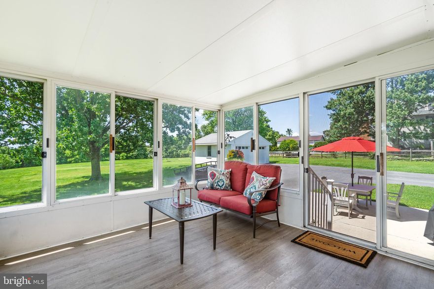 Welcome to your charming colonial home on nearly 3 acres in Rosedale! As you step inside, be greeted by the warmth of hardwood floors and an abundance of natural light pouring in through numerous windows. Entertain effortlessly in the spacious living room, and enjoy hosting memorable dinners in the dining area featuring built-in shelving and cabinets. The kitchen is a chef's delight, boasting plenty of cabinets, granite countertops, stainless steel appliances, and a stylish tile backsplash. Cozy up in the second living area, complete with plush carpeting and a fireplace, perfect for chilly evenings. A convenient half bath and laundry room complete the main level. Upstairs, discover three bedrooms and a full bathroom, offering ample space for rest and relaxation. The third bedroom is versatile, ideal for guests or a home office. The partially finished basement provides additional living space, perfect for a rec room or extra storage, along with attic space for your convenience. Step outside to the screened-in porch, your tranquil retreat for summer relaxation and entertaining. With an attached 2-car garage and a large driveway, parking is made convenient. Enjoy the spacious backyard and patio, offering endless possibilities for outdoor enjoyment. Updates included: driveway, roof on garage, new boiler, electrical panel, replaced septic tank pipe going from the house to the tank, bathrooms. Convenient to 95, 695, White Marsh, Towson, restaurants and shops. Don't miss the opportunity to make this delightful home yours! Schedule your showing today.