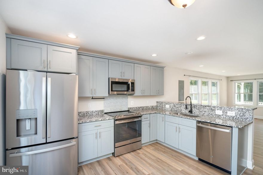 MOTIVATED SELLER — SELLER CONCESSIONS AVAILABLE — ALL OFFERS CONSIDERED!---Built in 2023, this nearly new home offers 3 bedrooms and 2 full bathrooms with modern finishes and quality craftsmanship throughout. Enjoy outdoor living on the welcoming 18x5 front porch or the spacious 12x16 rear deck, ideal for entertaining or unwinding after a day on the water.---Inside, the open floor plan features luxury vinyl plank flooring, granite countertops, stainless steel appliances, and recessed lighting for a clean, contemporary feel. The bathrooms are beautifully finished with tile floors and tiled walls, and the laundry room is also tiled for durability and easy maintenance.---Don’t miss this opportunity to own in Glebe Harbor, a sought-after waterfront community in Westmoreland County’s Northern Neck. Residents enjoy access to the Potomac River, multiple creeks, and four private beaches, perfect for boating, fishing, and relaxing by the water. The neighborhood also offers a clubhouse, swimming pool, tennis courts, boat ramps, walking trails, and more—bringing resort-style living right to your doorstep.---With a highly motivated seller, available seller concessions, and flexibility on terms, this home presents an excellent value and a great opportunity for buyers. Schedule your showing today and bring your offer!