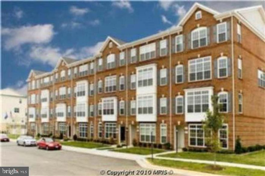 Gorgeous end unit townhouse. Loaded w/ Luxury upgrades & options. Gourmet Kitchen w/ granite
counter tops, 42" cherry cabinets, plantation shutters , hardwood floors , cozy gas fireplace, office nook and an open and spacious living room/dining room are on the main level.  Upper level  primary suite has a walk in closet and Jacuzzi tub.  2 additional bedrooms, full bath  and washer & dryer complete the upper level.   Enjoy all the amenities that this lovely community offers.    Walk to Brambleton Town Center's restaurants, Movie Theater, and Shops.