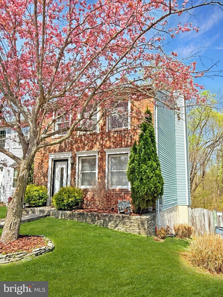 One of the best lots you can find. End unit backing to woods. Upper and lower level decks. Walkout finished lower level with fireplace and full bath. Updated kitchen with eat in area and slider to deck.