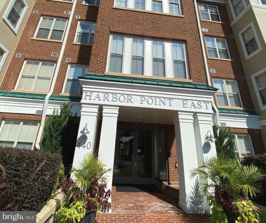 Welcome to the Luxury Condos of Belmont Bay. Located on the main level, unit 107 features 2 Spacious Bedrooms, 2 Full Bathrooms, a Fireplace, an Open Floor plan with a separate dining room, and a Private Balcony! One of only a few units with TWO assigned parking spaces in the convenient underground garage, steps from the elevator. Just painted throughout. The primary bedroom has a full bathroom with a stand-up shower and a walk-in closet. The other bedroom is across from the living room and has immediate access to the additional full bathroom. Spacious laundry room inside unit. Added storage bin area on garage level. New Hardwood floors gleam in the living, dining room, and kitchen. Luxury lobby and well-equipped fitness center! Join the Freedom Boat Club or spend lazy days relaxing by the water! Outdoor gazebo and pavilion along the brick pathways to enjoy. A highly desired location with plenty of guest parking outside the building and easy access to the VRE, I95, I95 Express Ways, and Route 1 with shops and restaurants immediately nearby. VRE, I95, Route 1 close by.