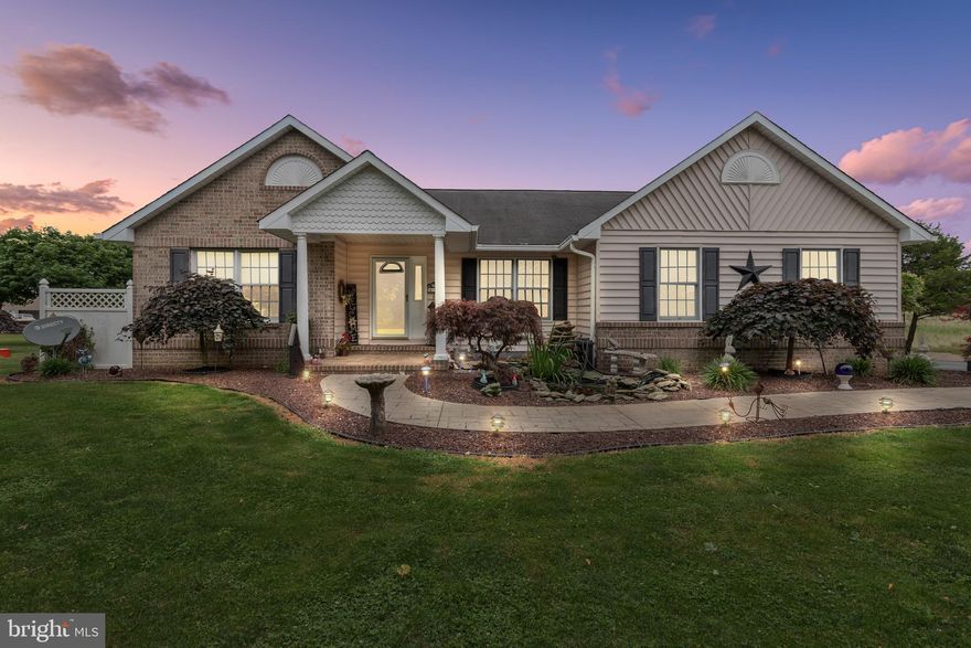 Nestled on 14.3 sprawling acres, this estate embodies the essence of serene living with a touch of adventure. As you wind up the long driveway, anticipation builds, unveiling a home that promises both comfort and boundless opportunities.

Step inside to discover a meticulously maintained 4-bedroom, 3.5-bath retreat where every detail has been thoughtfully curated. The main level boasts a welcoming 2 bedrooms, 2.5 bathrooms, and a den/office, ideal for remote work or quiet reflection. A spacious eat-in kitchen awaits, adorned with stainless steel appliances and bathed in natural light, perfect for culinary creations and casual dining alike.

The heart of this home beats with warmth and charm, with hardwood floors gleaming from recent staining and fresh paint enveloping every room. For guests or extended family, the basement in-law suite beckons with 2 bedrooms, a full kitchen, dining area and inviting game room, offering privacy and comfort in equal measure.

Outside, nature unfolds in all its splendor. The deck, recently restained, invites al fresco dining and sunset views over your expansive domain. Imagine mornings greeted by deer and turkeys roaming the property, a testament to the natural harmony here. Grow your own vegetables in the fertile soil approved for farming, or simply enjoy the tranquility of your surroundings. The land is also approved for raising any kind of farm animals and horses, allowing you to indulge your passion for equestrian pursuits or farming.

For those with hobbies or entrepreneurial spirit, a heated pole barn stands ready, complete with a pellet stove and running water. Whether it's a workshop, studio, or sanctuary, this versatile space accommodates your every endeavor.

And as if to welcome you home, a serene koi fish pond graces the entrance, adding a touch of Zen to your daily routine. Dual driveways ensure easy access, while a 2019 HVAC system and brand new bedroom carpets offer modern comforts throughout.

Seize the opportunity to own not just a home, but a lifestyle—a rare combination of comfort, versatility, and natural beauty. Schedule your private tour today and let this captivating estate inspire your next chapter. Your dream home awaits amidst 14.3 acres of possibilities.
*** LAND IS ACTIVELY LEASED BY A FARMER AND ACTIVELY FARMED ***