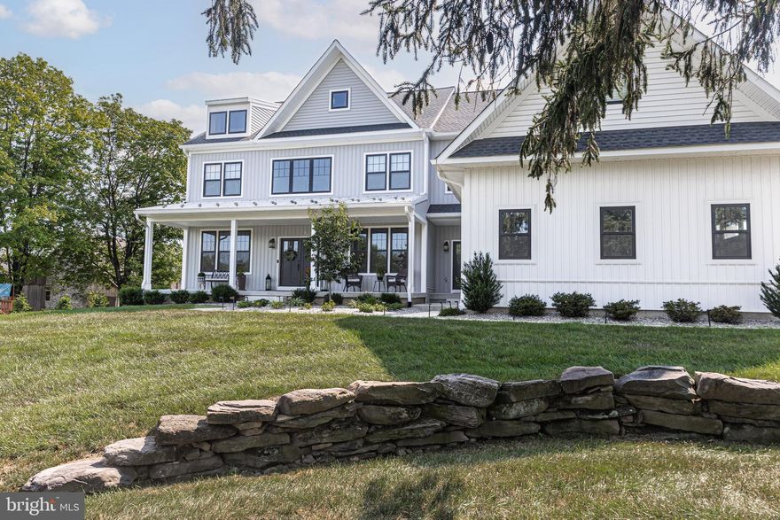 This exquisite five-bedroom, five-and-a-half-bath modern farmhouse is better than new construction ! Expertly crafted by Corsini Custom Homes, the residence showcases superior workmanship, thoughtful design, and premium materials, all tailored for today’s sophisticated lifestyles. A flexible open-concept floor plan features soaring 9-foot ceilings throughout and exquisite custom millwork. Upon entry, the two-story foyer creates a grand first impression. To the left, a spacious fifth bedroom with en suite bath offers versatility as a guest suite or home office. To the right, the elegant dining room is adorned with crown molding and board-and-batten detailing, ideal for refined entertaining. Hardwood flooring, which will extend throughout the main level, double staircases, and second-floor hallway. The chef’s kitchen is a true centerpiece, offering the opportunity to customize cabinetry, countertops (quartz or granite), and hardware. It comes equipped with top-tier appliances, including a 6-burner stainless gas range, built-in microwave, double wall oven, and refrigerator. A generous center island with breakfast bar seating enhances functionality and flow. The adjacent family room is anchored by a gas fireplace with a custom farmhouse mantle, opening onto a covered porch perfect for outdoor gatherings. Upstairs, two bedrooms share a Jack and Jill bath, while a third offers an en suite. The luxurious primary suite is a private retreat, boasting dual walk-in closets, a serene sitting room, and a spa-inspired bath with soaking tub, oversized “super shower,” and two water closets. Additional storage spaces throughout the suite ensure both comfort and practicality. A three-car side-entry garage with electric vehicle charging station. The home also features a whole-house generator, security and alarm systems, and high-speed cable and internet. The spacious basement (1,000 sq ft.) includes recessed lighting and a full bath, providing enhanced living space.
Additional highlights include public sewer, natural gas and no homeowners association!  Ideally located near Route 611 and situated within the award-winning Central Bucks School District, this property seamlessly combines luxury, flexibility, and convenience.  Schedule your personal tour now!