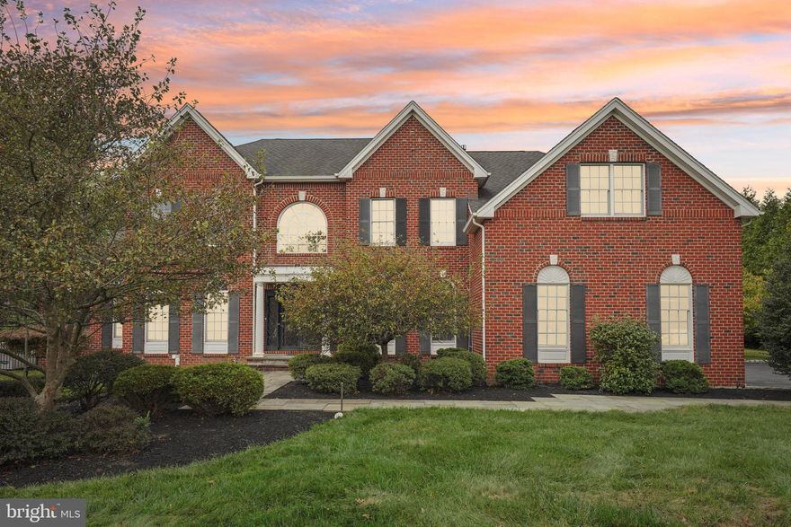 Nestled in the serene surroundings of Pennington, this exceptional residence offers a blend of elegance and comfort. The custom front entrance, featuring imported doors and a sophisticated foyer, sets the tone for the entire home. The first floor boasts both formal and casual living areas, including a conservatory and a library, perfect for relaxation or work. Enjoy the spacious family room, home office, and a well-appointed kitchen with a breakfast nook. The second floor features five private bedrooms and 4 full baths, including a luxurious master suite with its own office or dressing room.
The expansive lower level is designed for year-round entertainment with a game room, gym, media room, billiards area, powder room, and wine bar. Step outside to enjoy the beautifully designed outdoor terraces, complete with a pool and a covered outdoor living room with a fireplace. With a 3-car attached garage, ample driveway parking and a vast backyard ideal for recreation, this home is truly one-of-a-kind. Don't miss the opportunity to experience the unmatched charm of this property!