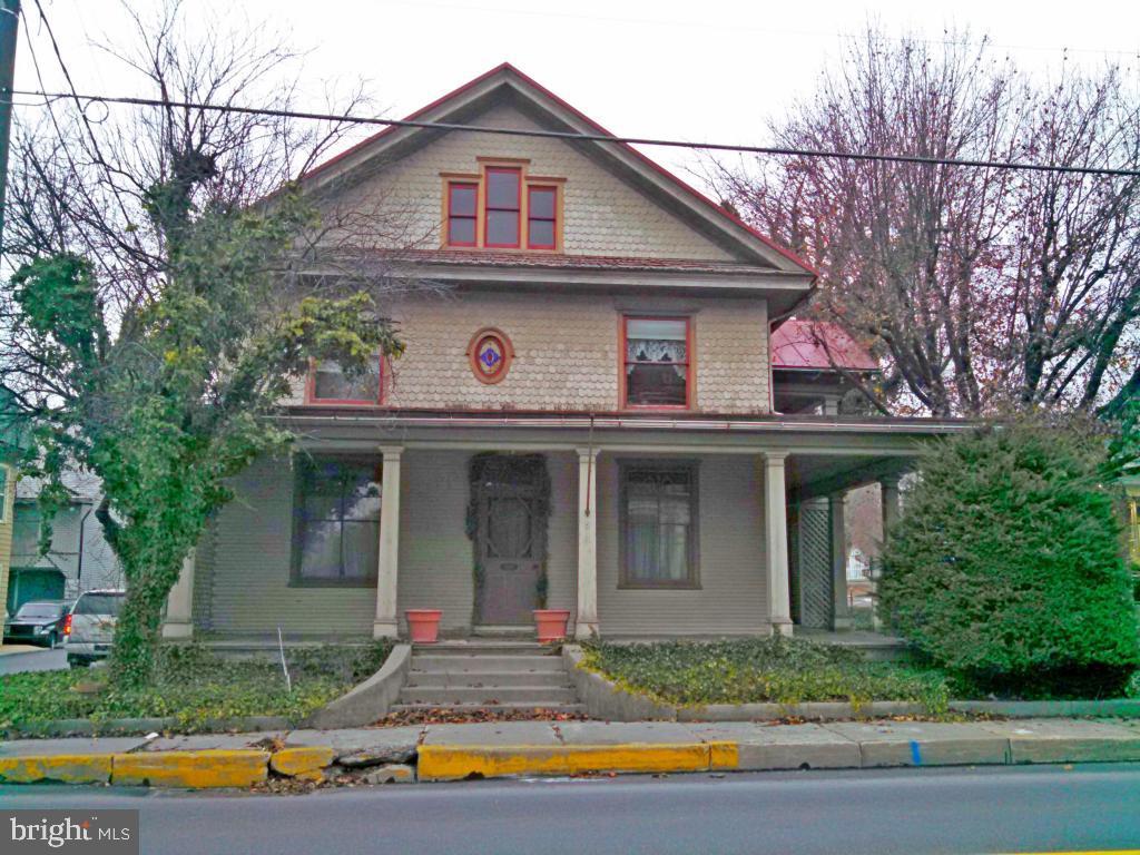 Stately 2 1/2 story, 4 bedroom w/lot of character/charm-Hardwood floors, colonial trim & moldings-Stained glass transoms & windows-Original built in cabinets, shelves-Custom kitchen-Updated interior paint-Double sided staircase-Spacious home-Must see estate sale-Selling ''as is''