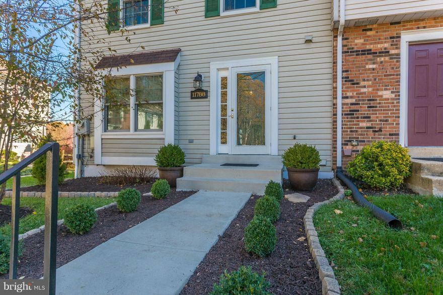 So many upgrades! New Walkway, Newer HVAC, Windows and doors, Updated Master and Hall baths, kitchen with SS Appliances and granite counters with gorgeous cabinets, hardwood flooring on main and upper levels! Maintenance free composite Decks on upper and lower levels! Replaced Polybutylene  main water pipe!