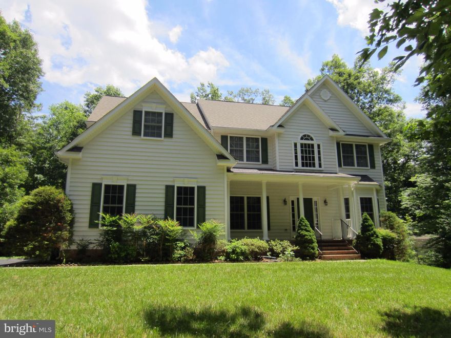 Lovely property on 3 acres in the western side of Stafford with wooded privacy! Main level has hardwood flooring, kitchen with morning room area looking out onto the deck and trees, two story family room, office, and dining room. Upstairs has a large master bed & bath with nice soaking tub and 2 organizer style master closets. Unfinished basement for storage, workout or whatever suits you!