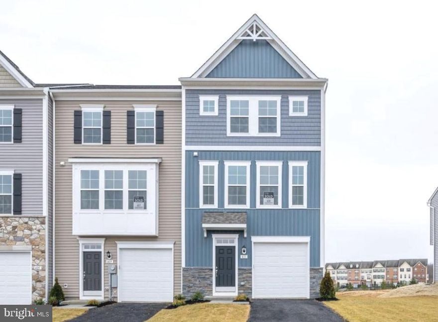 Make the desired location of Martinsburg Station your home. The Darlington II end unit, Elevation 11, is a stunning three-level townhome with a morning room extension. This fully finished, one-car garage home offers three bedrooms and 3.5 bathrooms. The garage level boasts a spacious recreation room with a full bathroom and a walkout to the generous rear yard.

The open-concept main level features elegant cabinetry, quartz countertops, an 8-foot kitchen island, and stainless steel appliances. Luxury vinyl plank flooring extends throughout this level, as well as the foyer, all bathrooms, and the laundry area. For added convenience, the laundry is located on the upper level. Enjoy the community pool! Contact for a tour. Tawny Zuniga 830-279-9551