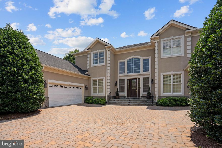 This meticulously upgraded residence was designed for both grand entertaining and calm retreats. This home sits in a cul-de-sac, with a sub-community of 12 homes. Quiet street and once the Former Model Home.  Travertine flooring (limestone) found on the main level. BONUS: In-law suite on the 1st floor with full bath and large closet.  It features multiple luxurious gathering spaces, resort-style outdoor amenities, and elegant architectural detailing throughout — all within one of Ashburn’s most coveted gated neighborhoods. Whether you’re hosting guests poolside, enjoying theater-level entertainment, or watching the sunset from your terrace, 43589 Edison Club Court sets a benchmark in upscale living. This elegant entertainer's estate offers  5 Beds, 5 Full/2 Half Baths,  and over 10,000+  sq.  ft. of living space.

Nestled in the gated Belmont Country Club community, this custom semi‑built estate sits on approximately 0.54 acres with impressive views of a golf course and serene lake from the upper‑level terrace.
Spacious luxury living across two family entertainment floors and finished lower basement.  See the 
spectacular outdoor spaces: Designed for entertaining with a salt‑water pool and spa, expansive patio and hardscape, screened porch, plus a veranda with outdoor kitchen and wood‑burning fireplace. 
Stunning Interiors include rich travertine and hardwood flooring, soaring ceilings, custom moldings, a grand foyer with butterfly staircases, and a double‑sided fireplace linking the family room and kitchen. The gourmet kitchen is equipped with commercial-grade stainless steel appliances, a center island, a pantry and opens to the family room. The versatile main level living includes a second primary suite, extensive built-ins, and a solarium party/music room with a built-in bar. Must see in person to appreciate the beauty of this magnificent home.

Amenities Galore: Finished four-car garage; professionally designed multi-level theater, full dance floor, designer decor, and impeccable, move-in ready condition with over $500k in builder upgrades. The entire roof was recently replaced, and electric shades throughout the home will convey.