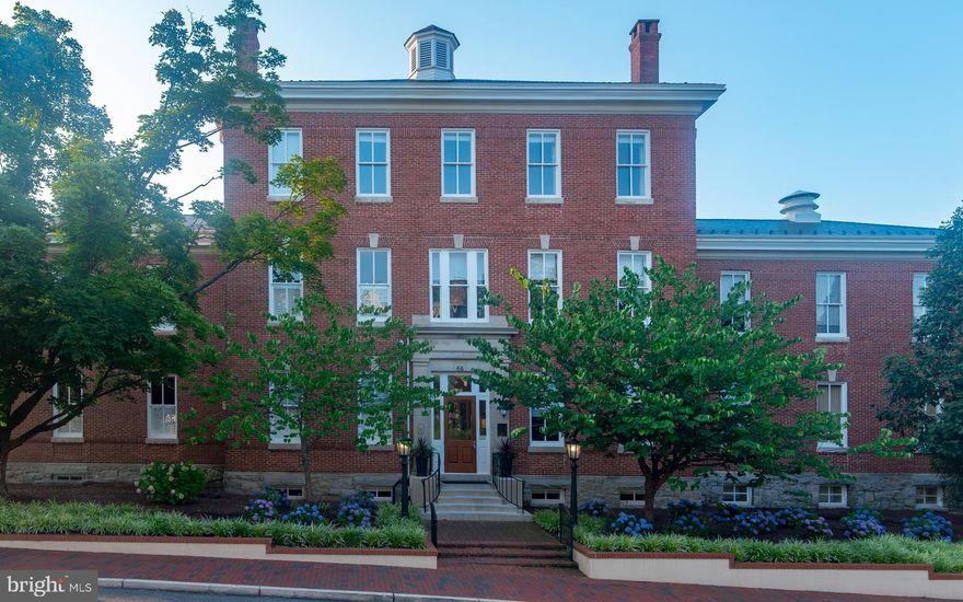 Condo Documents are available if requested.  Stunning and spacious Penthouse comprises the top level of Historic Acton's Landing's original building.  Bank of large windows across the entire front of 66 Franklin Street flood the great room with natural light and provide a bird's eye view of city life. There are exquisite details throughout including gorgeous crown molding, high ceilings and wood floors. Newly updated kitchen features silestone counters, custom tile backsplash, gas cooking, and wine fridge, Off the kitchen is a cozy study/office with stair leading to the fitness center. The inviting primary suite has a large walk-in closet,  a beautiful updated bath and three extra closets.  Step out from the primary onto your private deck overlooking the rooftops of Murray Hill and Historic Annapolis. All bedrooms are ensuite.  Enjoy deck on both sides of the unit for sunrise and sunset views. Secure elevator opens directly into the welcoming foyer with main living on the right and a bedroom suite on the left for added privacy. This penthouse includes two deeded parking spaces. 66 Franklin is a secure building and offers concierge services, social events, a fitness center, a library and community room. The unsurpassed location is 1 block to Church Circle making it perfect for a quick stroll to dozens of restaurants and shops and just steps to the waterfront to hop on the water taxi but also has the feel of being a part of residential neighborhood.