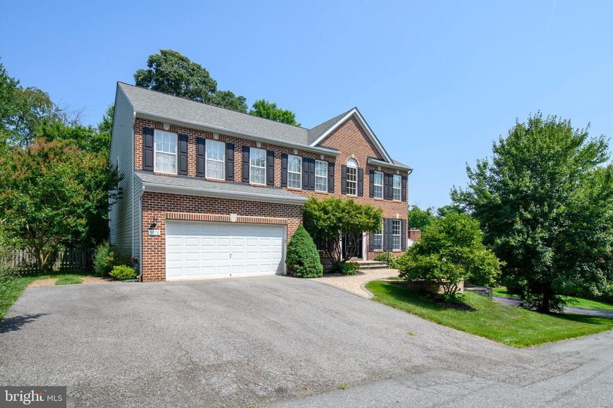 You can have it all! Rarely available private community surrounds this over-sized, open floor plan, brick-front colonial with over 4000 sq. ft. finished and nearly 5000 total. Tons of updates include the large kitchen with room for an 8-person table or island and a new sliding-glass door leading to the upper patio. The kitchen bar area has lots of custom cabinetry and separates the spacious family room and kitchen. The huge primary bedroom has a custom tray ceiling, large walk-in closet plus an additional closet and the updated primary bathroom has custom tile with an expansive shower and tub. The hall bath is also completely remodeled. The upper level comes with 4 other bedrooms, one of which could serve as an upper-level rec room or playroom and it includes new carpeting.  The newer roof is a huge plus and other updates include the upper level HVAC, front hardscape and doors. The fully fenced rear yard offers an abundance of level space, mature trees and plantings and the the multi-level patio areas can handle all of your entertaining needs. The large lower-level Family/Rec Room is pre-wired for surround sound and features a built-in bar area plus the basement includes another full bath. There is also a slider leading to the lower patio. This level also has plenty of room for a workshop, storage with built-in shelving and a separate hobby or brewery room or even a small in-law suite since it includes two gas hook-ups. The awesome Rockburn Park is only a 6-minute bike ride away and nearby shopping abounds as well as a short two-minute drive to Route 100 access and five minutes to I-95.