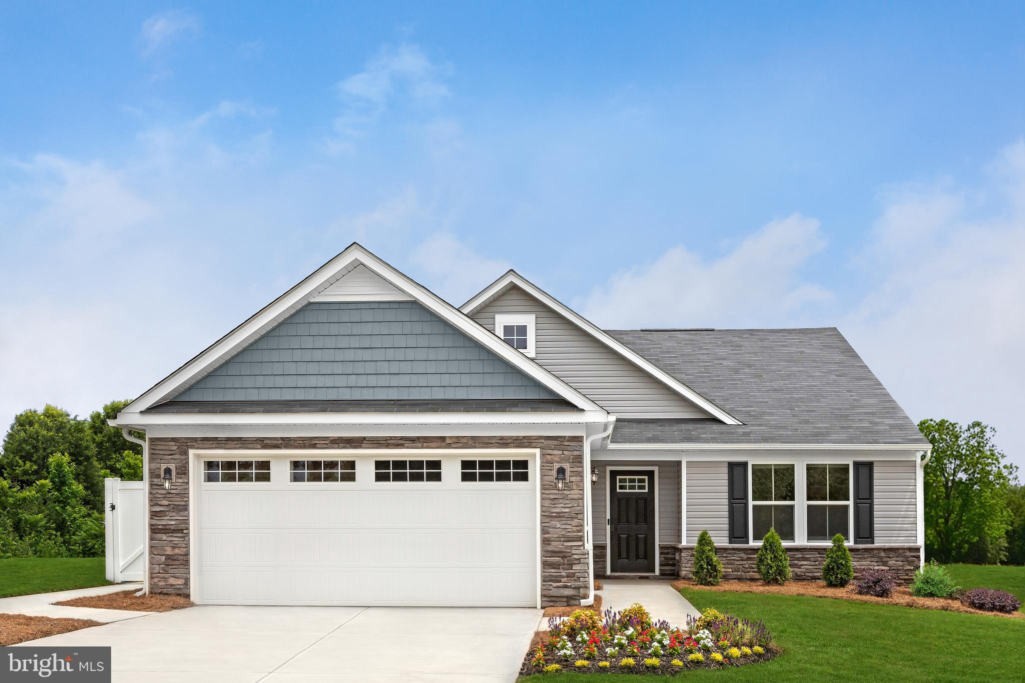 To be built GRAND CAYMAN at Martinsburg Lakes by Ryan Homes. You want to live a casual easy life, in a big way. You'd rather travel and enjoy an active lifestyle than serve a four course meal in your formal dining room. The Grand Cayman is the ideal home for your casual well-lived lifestyle. The open airy space combines the kitchen, dining area and great room to create a casual comfortable flow. This is the perfect place to do all your entertaining with plenty of room for your favorite overstuffed couch. Throw a Superbowl party that will be the envy of the neighborhood. For a relaxing night in, it's your home theater. Since it's open to the kitchen, grab a snack or make dinner, you won't miss your favorite TV show. The Grand Cayman is the perfect home if you enjoy life's simple pleasures. All the details have been taken care of for you! Wider doorways & hallways, Owner's bathroom with walk-in shower and seat, level handled doorknobs, lowered light switches, and more. Main-level living has never been so convenient! Enjoy sidewalk lined streets, beautiful meeting areas, or take your furry companion for a walk to the dog park. Enjoy a picnic in the pavilion and let the kids or grandkids play at the tot lot. It's that easy. What are you waiting for? Martinsburg Lakes - One Level Living will allow you to own a new home and take advantage of all the benefits of owning! Martinsburg Lakes offers floorplans for everybody! It's the perfect match for those looking to downsize. Contact us today! Other homesites are available. Photos are representative. Ryan Homes is taking precautionary measures to protect our valued customers and employees. Our models are open by appointment.