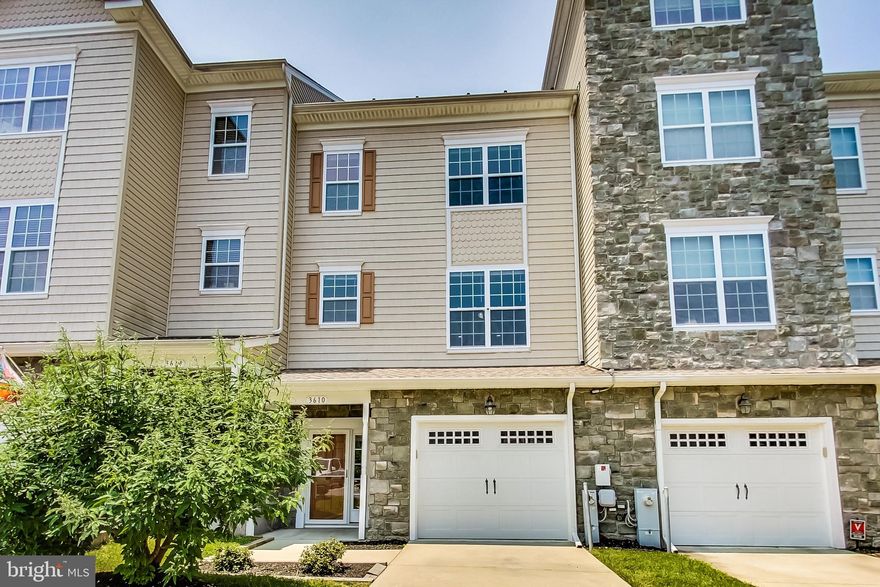 Dreams Do Come True! Experience the Essence of the North Beach lifestyle in this 3-story Colonial Townhouse that comes with free beach access. Your new home is nestled in a desirable location, & it's Just a short walk or a quick bike ride to the picturesque Chesapeake Bay and the boardwalk. This 4-bedroom, 2-full bath, and 2-half bath beauty is a money saver.  You'll never have to buy bottled water again because this home is outfitted with a "WHOLE-HOME WATER FILTRATION SYSTEM",  & Enjoy a 10-dollar monthly electric bill because the house is topped off with Solar Panels that are OWNED OUT RIGHT! YES, NO MONTHLY SOLAR LEASE. The panels are included with the home, bringing an additional $40,000 in value! This home Feels Brand New. It's been freshly painted from top to bottom, & new flooring has been added throughout.   The open-concept and spacious floor plan will not disappoint. Bring your imagination to this entry-level.  When you walk through the front door, you'll be greeted with an inviting foyer adorned with luxurious and gleaming hardwood floors that flow into a cozy office space that has sliding glass doors that open to a private, hardscaped backyard that's enclosed by a 6-foot-tall vinyl privacy fence. It's the perfect place to relax, host a BBQ or enjoy a refreshing drink. On the entry-level, you'll also find a half-bathroom and a large flex space that's perfectly suited to meet any of your needs. It can be an excellent 4th bedroom, entertainment area, rec room, or virtual learning space. Head up to the second level to find an airy, open-concept main living space with a second-half bathroom. The spacious Gourmet Eat-In Kitchen will delight the cook, & the cabinet space will not disappoint. It has large 42-inch cabinetry with under cabinet lighting, a center island, and a modern appliance package featuring a Thin-Q smart refrigerator with Instaview door-in-door technology, Wi-Fi, and double freezer drawers. It's all complemented by a center island, striking granite countertops, & a stylish stone backsplash. The pantry has motion sensor lighting. Open the sliding glass doors to let in the fresh air, or head outside to relax on the recently added trex deck with a RETRACTABLE AWNING. The deck is the perfect extension to the living space & a great place to enjoy your morning coffee or evening drink. The living room has a fresh, airy appeal, and brand-new plush carpeting and electrical outlets have been installed, so you don't have to worry about the unsightly cords hanging from your wall-mounted flat-screen TV. On the third level, you will find Three additional bedrooms with brand-new carpeting & two full bathrooms. Your laundry facilities are also conveniently located on the 3rd floor. The Owner's Suite has a walk-in closet & spacious en-suite bathroom with a deep garden-style soaking tub, a separate walk-in shower with a modern shower head & contemporary double vanity. San Francisco By the Bay Townhomes provides a relaxing & friendly lifestyle with many local gems. Your New Community is just a short drive to downtown Annapolis Capital City and Shopping Havens. The MTA Commuter Bus 820 has Service into Washington DC on weekday mornings, returning early afternoons into evenings for Commuters—Head to Chesapeake Beach Waterfront Park, where you enjoy the cool water slides. There are Kayaks and bikes and boat docks you can rent. Lots of dockside and local eateries to explore! All of this is within walking distance of your home. You will love the local restaurants in and around the Twin Beaches of Chesapeake and North Beaches. The areas are a walker's paradise - and a biker's haven! Overlook Park and North Beach Park provide nature walks and artwork. There is plenty of local shopping down by the boardwalk. April through October, the Farmers Market is open Every Saturday. The Art/Car shows are held on the first Friday of every month with Music and Dancing, and they host movies on the Beach and Drive-in Movies. Welcome Home!