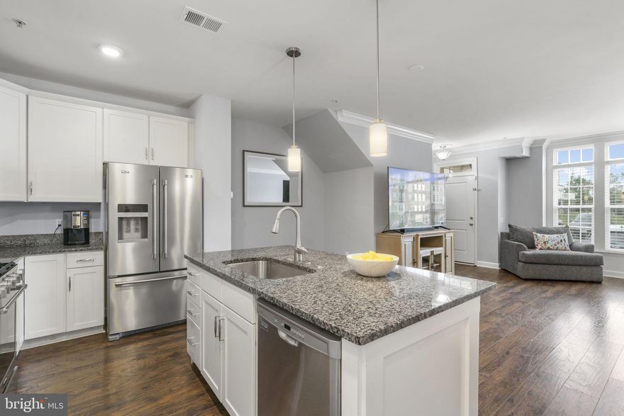 WELCOME HOME!! This gorgeous two-level townhouse-style condo is located in the heart of the sought-after East Gate community of  South Riding/Chantilly. Fresh Paint and New Carpet! The open floor plan gives this home a spacious feel and provides for an abundance of natural light. The main level offers beautiful upgraded vinyl hardwood flooring throughout, a gourmet kitchen with stainless steel appliances, quartz counters, and a massive island. Perfect for entertaining. The owners living level boasts an oversized room, spacious closets, and a laundry room on the same floor. A relaxing on the outdoor balcony awaits on the upper level. The master bedroom and bath are sure to make you smile. Upgrades throughout, updated light fixtures, and more storage space than you'll know what to do with! The master bath features a double vanity, soaking tub, and separate shower. Location is everything! Sought-after East Gate community includes wonderful community amenities: swimming pool, clubhouse, playground, walking trail, and beautiful mountain views. Just minutes to dining and various shopping; including Costco, Harris Teeter, Target, Walmart, Home Depot. The perfect commuter location! Route 50, 606, Braddock and 66 all nearby.