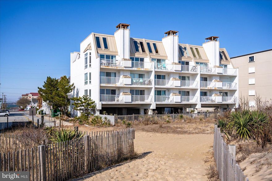 This stunning  1BR/1BA direct oceanfront condo was just renovated.  This is the perfect location - an east side corner unit with an abundance of light and extra windows.  This condo is located on 75th street. The minute you walk in the door you will fall in love with the open floor plan and the ocean views.  The family room is very spacious and has a fireplace for year round enjoyment. The upgraded kitchen has a beautiful breakfast bar, quartz countertops and new stainless steel appliances.   The condo is being sold fully furnished -  just bring your suitcase. You can relax on the beach front balcony and soak up the sun and sounds of the ocean.  There is ground level storage for all your beach toys.  Schedule your appointment today to see this great condo before it's SOLD.  Upgrades include: New flooring, New HW heater, New HVAC Heat Pump, and the Wi-Fi allows you to check on the unit and change settings remotely.  There is also a Newer washer dryer, New Appliances, New Furniture, Updated bathroom, Italian marble tile hearth, New Lighting, New doors and all New cabinets.
