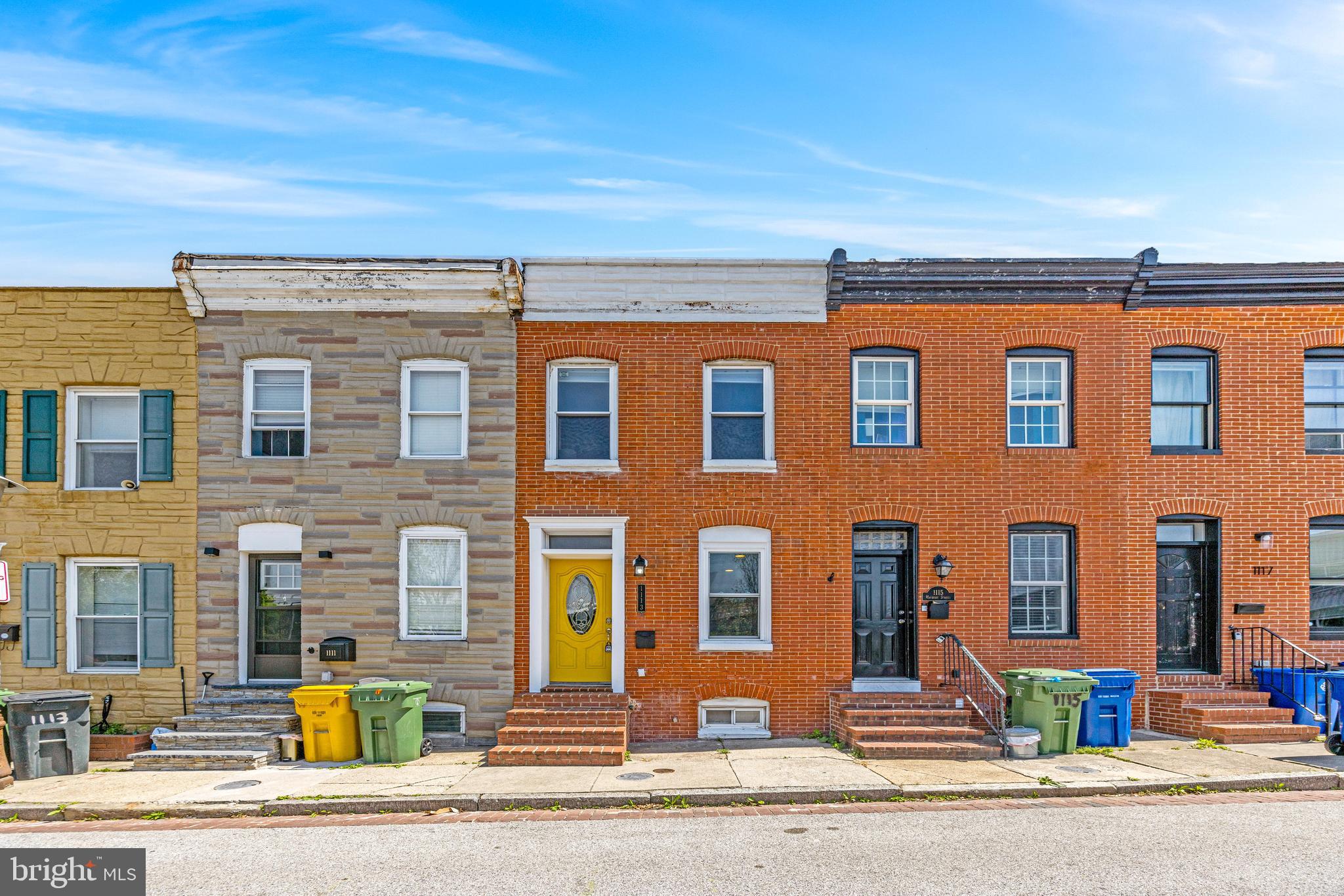 Location, location location! This charming turnkey Locust Point townhome welcomes you in with exposed brick wall accents and beautiful hard wood flooring. The kitchen has custom cabinets, stainless steel appliances, and plenty of counter space! The second floor showcases the primary with ample closet space and a second bedroom with deck access. The basement level has a finished den space. Conveniently located near Baltimore water taxi, Ft McHenry, Under Armour facility, and endless shops and restaurants. Welcome Home