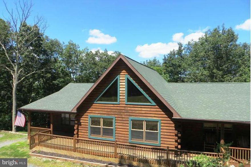 Incredible, quality built,  custom log home situated on 3 acres.  Convenient to both Winchester VA and Romney WV for easy commute. Plenty of room with  3200+/- sq ft of living space. So much to offer, 4 br, and a generous loft area, 3 ba, recreation room, family room, and gourmet kitchen. Stay cozy and warn and save $$  warm with a professionally installed outdoor woodstove. MSTA.