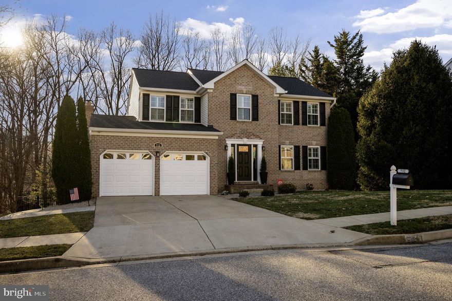 Welcome to 732 White Oaks Ave — a beautifully maintained brick colonial tucked away on a quiet street in sought-after Catonsville. This spacious home offers the perfect blend of classic charm, modern updates, and exceptional indoor and outdoor living, all just minutes from Patapsco Valley State Park.
Step inside to a bright, welcoming foyer with updated flooring (2020) and a striking staircase. The main level features a beautifully remodeled kitchen (2017) with granite countertops, ample cabinetry, and a large center island perfect for everyday living and entertaining. Sliding doors lead to a screened-in porch overlooking a peaceful wooded backdrop — an ideal spot to enjoy morning coffee or relax in the evenings. The outdoor living space is truly a standout feature of this home. The expansive covered patio below the deck is designed for entertaining and includes a custom built-in outdoor kitchen with stone counters, built-in grill, sink, prep space, and storage. With string lighting, a ceiling fan, and multiple seating areas including space for a fire pit, this incredible outdoor retreat provides the perfect setting for gatherings year-round while enjoying the privacy of the tree-lined lot. Upstairs you'll find generously sized bedrooms including a spacious primary suite featuring a large walk-in closet and a spa-like ensuite bath designed for comfort and relaxation. The finished lower level adds additional living and entertaining space complete with a custom bar area, perfect for hosting game days, movie nights, or gatherings with friends and family. Major updates include a new roof (2023), new shutters, gutters, and soffits, replacement windows (2020), updated flooring (2020), and a remodeled kitchen (2017). Located just minutes from the hiking and biking trails of Patapsco Valley State Park and offering convenient access to I-695, I-95, Route 40, and Route 29, this home combines peaceful surroundings with easy commuting to Baltimore, Columbia, and beyond.