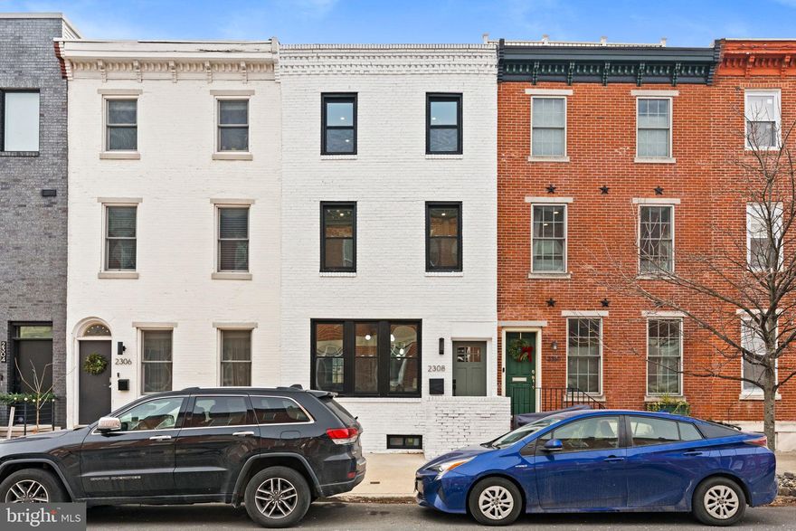 Situated in the heart of Philadelphia’s coveted Graduate Hospital neighborhood, this updated 4-bedroom, 3-bath townhouse delivers 1,729 sq ft of modern style and comfort across multiple levels! Behind its classic brick exterior lies a bright, open interior filled with natural light, tall ceilings, and warm wood-toned flooring that instantly feels inviting. The seamless connection between the contemporary living and dining areas makes any gathering effortless. The kitchen is a true centerpiece, designed for both everyday ease and entertaining, featuring a multi-seat waterfall island, sleek stainless steel appliances, a pro-grade range with pot-filler, and a generous walk-in pantry to keep everything organized. The floating staircase adds architectural flair as it guides you up to the tranquil bedrooms and full bath on the second level, and a third story focused on the serene primary retreat with its rejuvenating ensuite, while also hosting a handy separate water closet. Venture outside to a private concrete patio, ideal for relaxed evenings and weekend BBQs, or enjoy the top-floor deck for catching city sunsets followed by quiet nights under the stars. A finished basement adds versatility for an office, gym, or media zone. Set just blocks from Center City, with easy access to Schuylkill River Park, local transit, top universities, and some of Philly’s best dining and nightlife, this location blends convenience with lifestyle. Get ready for an elevated experience with this home!
