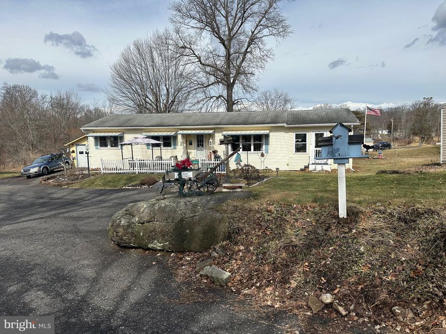 This large unique home is situated on an oversized lot near the pool and golf course . The home has had several expansions such as a large sunroom with a propane heater and surrounded by windows. a 3rd bedroom was added with electric baseboard heat, a garage with an attached workshop. All rooms are generously sized. The land lease includes use of the pool, mini golf, chip and putt ,fishing ponds ,use of the community hall for private functions and 4500gallons of sewer use quarterly. Park approval required