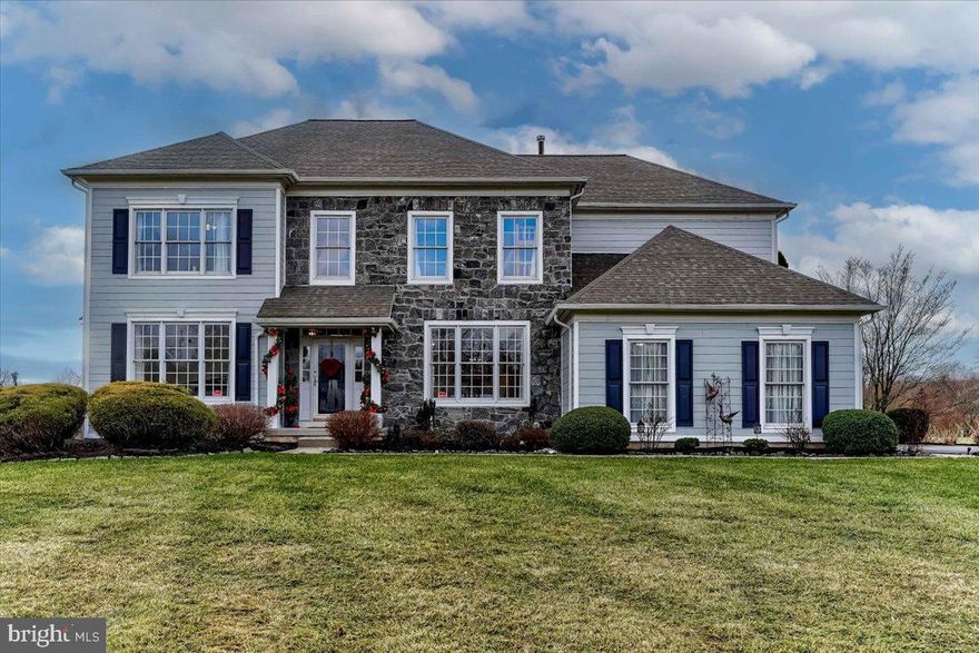 Exceptional meticulously maintained 5 bedroom, 4.5 bath Pulte built colonial home nestled on the Hickory Drive  cul-de-sac in the sought after Brookside community of Glen Mills; just across from the Garnet Valley School campus, the Concord Township Park, Dog Park and Rachel Kohl Library, complimented by a beautifully landscaped premium 1.4 acre level lot, with fabulous indoor & outdoor living spaces, perfect for expanded gatherings & entertaining.  Easily accessible to the Brandywine Youth Club, dance studios, Darlington Arts Center, dog parks & all commuting routes to corporate centers, Delaware tax free shopping, airports, Philadelphia, Wilmington, Media, West Chester & more. This stunning  turnkey home has been lovingly maintained & features countless custom upgrades and updates inside and out by the current owners, who are only selling due to an out of country relocation, and has everything a family could possibly desire including an exquisite gourmet chef’s kitchen, a fantastic daylight walk out finished lower level providing 1,104 square feet of additional living space that includes a great room, a 5th bedroom with a large walk in closet and there is a full  bath; perfect for nanny or in-law suite,  and walks out to the paver patio, hot tub and sprawling backyard.  This home is breathtaking inside & out in every way from its lushly landscaped yard, its grand stone & Hardie plank front exterior, a charming main entry portico that walks into the grand towering main entry foyer and an open functional floor plan.  A formal living room flanks the main entry foyer to the left with lots of natural light via its bay window looking out to the side yard and triple adorned by crown moulding. To the right of the main entry foyer is a lovely formal dining room with custom trim mouldings that is adjacent to the gourmet kitchen and easily accessible via a butlers pantry.  The tiled gourmet chef's kitchen features lovely cherry cabinetry, all new stainless appliances and a center island with an updated Jenn Aire cook top with a downdraft exhaust, granite counters, tile backsplash, a large walk-in butler’s pantry, pendant lighting, double wall ovens, built in microwave, and a sunny breakfast room that walks out to the enclosed sunroom with walk out access to a low maintenance walk down deck leading to the backyard and lower patio.   The gourmet kitchen and breakfast room is open and adjacent to the large and spacious grand two story family room featuring lots of natural light via the large two story wall of windows, a cathedral ceiling and a cozy gas fireplace.   Another great feature located on the main level is a private main level office that is adjacent to a half bath for convenience. There is a mudroom off the kitchen with convenient indoor access to the two-car garage and main level laundry room with built in cabinetry. On the upper level, you'll find a luxurious and grand master suite with breathtaking views over the backyard, an inverted octagonal pan ceiling, an oversized walk-in closet, a tiled ensuite master bath featuring double vanity's, a whirlpool tub, a separate stall shower and a private water closet. Completing the upper level are three additional spacious bedrooms including a Jack & Jill Suite with a shared bath and a Princess Suite with its own private bath. The finished basement has a large open & functional great room, sitting area as well as a spacious 5th bedroom that has walk in closet and there is a full bath also located on the lower level as well as a large storage and utility area.   Additional updates & upgrades include new Hardie plank and stone front exterior (2021), newer HVAC system (2014), newer tankless water heater (2015)  newer roof (2014), all new carpet (2023), complete interior repaint (2023) all new lighting (2023) and more.  This lovely well-updated & maintained home is move-in ready w/ nothing to do but enjoy all that this exceptional home has to offer.
