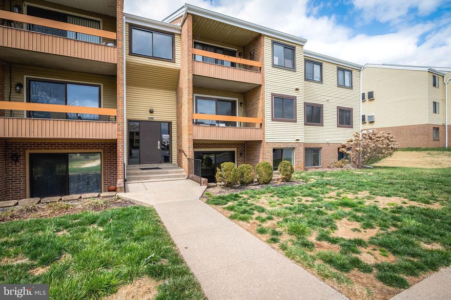 Located in the heart of Hampstead, this recently updated and meticulously maintained 1 Bed / 1 Bath second level condo features LVP flooring and fresh paint throughout the well-lit living room, bathroom, and eat-in kitchen with a private, covered balcony facing trees to the rear. The spacious bedroom boasts new carpeting complete with an oversized walk-in closet. Unit conveys with an additional, secured storage room on the 3rd floor and an assigned parking space. Condo fees include management, water, sewer, trash, and grounds maintenance. Can't beat location convenient to downtown, fine dining, schools, parks, golf, shopping, and more!