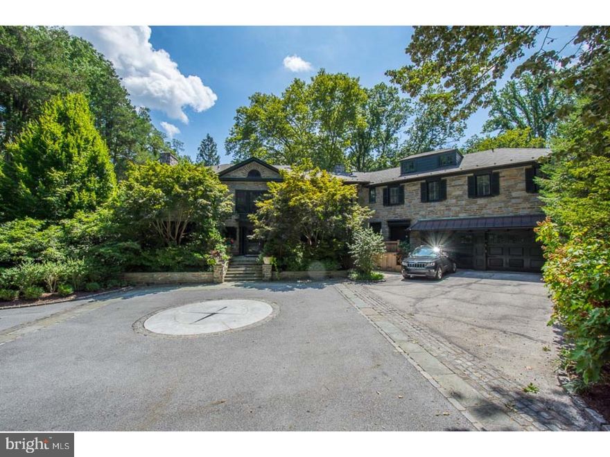 Stunning cut stone federal styled six bedroom 5.2 bath mansion located on maturely landscaped,  private 1.94 acre parcel with sports court and magnificent four season covered out door entertaining pavilion with stone fireplace, heat lamps and audio system in Merion Golf Manor. Architecturally impressive and impeccably designed.