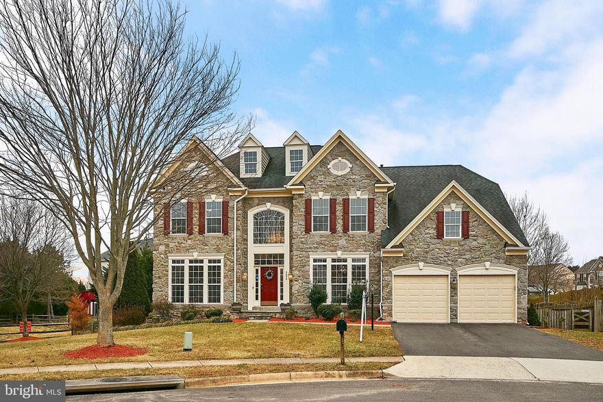 PRICE REDUCTION!  You MUST SEE this stunning stone front home in Hunt Chase (Westmarket Landbay).  Amazingly open and beautifully updated 4 BR, 3.5 bath home is move-in ready with many recent updates.  Formal living and dining rooms, large office and open floor plan offers great living space. A stone fireplace in the family room is open to the gourmet kitchen with SS appliances, gas 6-burner cooktop, double ovens and built-in microwave.  A generous sized pantry, desk, butler's pantry, island and brand new  tile flooring with upgraded granite counters  provide an amazing kitchen to entertain.  It also has a main level laundry room with front loading washer/dryer and access to the back deck and yard. Luxurious master with sitting room, dual walk-in closets and master bath with soaking tub, dual vanities, separate shower, and private toilet will make you fall in love with this home. Large, comfortable rooms, princess suite and Jack and Jill bath between two bedrooms make up the upper level. This home also has a large basement (unfinished with rough-in for future bathroom) and a walk-up staircase to a fenced year yard, expansive deck and good sized shed. A two-car garage completes this fabulous home situated on a cul-de-sac. All new paint, new carpet, new tile, granite, double ovens, and microwave are part of the recent renovation.  Close to shopping, I-66, hospital and all amenities.  Community amenties are tennis courts, pool, and tot lots.  Electric Car Owners:  There is a receptacle for your car charging needs in the garage!  Extra parking on the street.