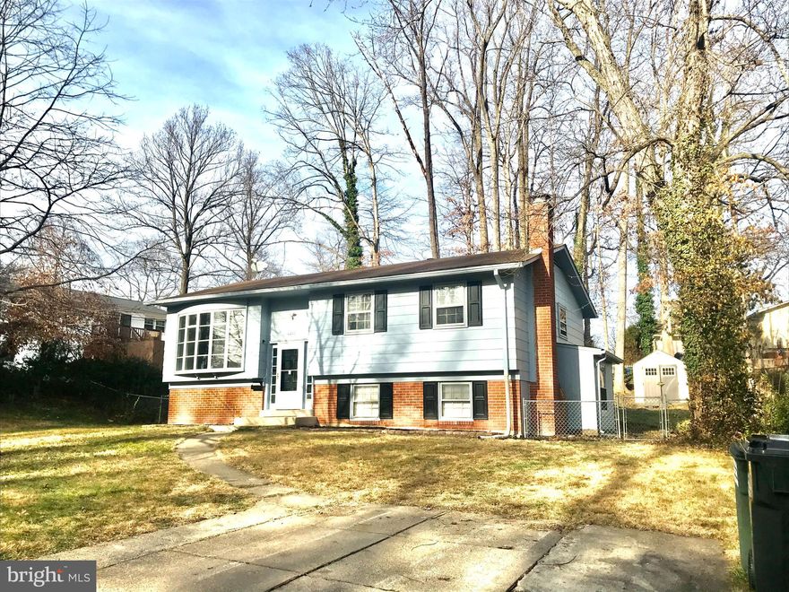 LOCATION LOCATION GORGEOUS TOTALLY RENOVATED 4/5 BR 2 FB SPLIT FOYER , NEW GOURMET KITCHEN  WALK OUT TO A HUGE DECK GREAT FOR ENTERTAINING WITH NEW APPLIANCES WITH GAS COOKING , UPDATED BATHS WITH NEW TILE, REFINISHED  HARDWOOD FLOORING , NEW WINDOWS, FRESH PAINT   LOWER LEVEL WALKOUT , LARGE FAMILY ROOM WITH WOOD BURNING FIREPLACE , WALK TO ELEMENTARY SCHOOL , WALKING DISTANCE TO SHOPPING CENTER, COMMUTER TRAIN,.  A GREAT PLACE TO CALL HOME.