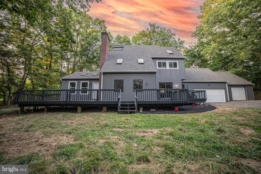 Here it is!  Your private 5 acres just minutes to quaint Shepherdstown and great location to commute!  This home offers 4 bedrooms, 3 full bathrooms.  2 bedrooms and 2 bathrooms are on the main floor, one of them being an expansive master suite with a huge walk-in closet, vaulted ceilings and lots of windows and skylights!  LVP through the main floor.  New roof and gutters, HVAC system, kitchen and bathrooms.  The kitchen offers white cabinets, quartz counter tops, and stainless steel appliances.  Very light restrictions but no HOA.  It is believed you could have a small farmette.  Large garage spaces with new doors and openers.  Huge deck overlooking private yard.  High speed internet might be available through Comcast, buyer should verify all information.  Agent is owner.