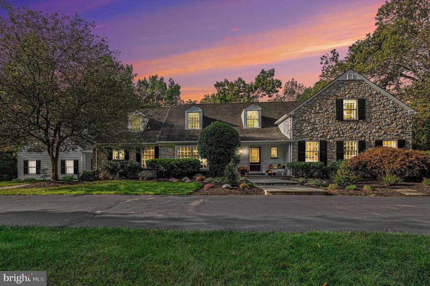 Welcome to Holly House located at 1408 Grasshopper Lane, Gwynedd Valley
Situated in prestigious Gwynedd Valley, this magnificent 5-bedroom, 3.5-bath stone home spans over 6,000 square feet of refined living space on 1.5 acres. Offering timeless elegance and exceptional attention to detail, this home boasts breathtaking views of its expansive grounds from every room. As you approach via the circular driveway, you are greeted by a stately stone façade and a large, fenced backyard that invites outdoor living and entertaining.
Interior Elegance
Step inside to find magnificent hardwood floors, wide hallways, and spacious rooms enhanced by intricate moldings, wainscoting, and deep windowsills throughout. The formal living room is a classic retreat with built-in bookcases, a fireplace framed by Dickens Character tiles, and a door leading to the slate patio—perfect for quiet mornings or hosting guests. The spacious dining room features a built-in china/linen closet and a deep-silled window, adding charm and function to your entertaining needs.
Gourmet Kitchen & Family Room
The heart of the home is the gourmet country kitchen, thoughtfully designed with custom cabinets, a central island, Sub-Zero refrigeration, a gas cooktop, and double ovens. Adjacent to the kitchen, the large family room impresses with its vaulted wood ceiling, tiled floors, and a stunning floor-to-ceiling stone fireplace. This room is perfect for gatherings, with a built-in wet bar, complete with a wine refrigerator. French doors that open to the slate patio.
First-Floor Owner’s Suite & Private Study
The luxurious first-floor Owner’s Suite provides a serene retreat with a gas fireplace, built-in bookcases, and a walk-in closet with a convenient pocket door. The ensuite bathroom is a spa-like oasis with a soaking tub, separate shower, and double vanity. Across the hall, a private study that offers the ideal space for work or relaxation. This area can be closed off by a pocket door and could be used as an in-law’s quarters or au pair suite.
Second Floor Accommodations
Upstairs, you’ll find four spacious bedrooms with hardwood floors throughout, large closets, and two full baths. A cedar closet provides special storage and offers additional space for your storage needs. Every room is designed with comfort and functionality in mind, ensuring a peaceful living experience for family and guests alike.
Finished Basement & Additional Features
The fully finished basement extends the living space, complete with built-in surround sound, multiple storage closets, and additional space for recreation or a media room. The home also includes an oversized 3.5-car garage, accessible via a charming breezeway.
Unbeatable Location
Located just a short walk to the Gwynedd Valley Station, this home offers suburban tranquility while still being conveniently near top-rated private schools, Wissahickon school district, parks, shopping, and accessible to major highways. Whether you’re hosting a gathering or enjoying the peaceful surroundings, this exceptional property provides the perfect blend of luxury, comfort, and practicality.
Schedule Your Private Tour Today
1408 Grasshopper Lane offers an unparalleled living experience with its exquisite features and timeless appeal. Come see this beautiful Gwynedd Valley estate and discover your new home.