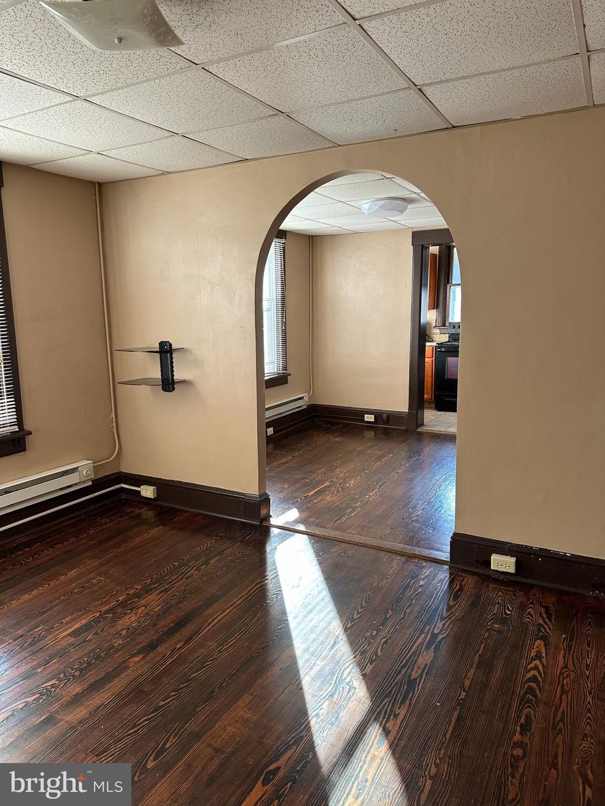 Beautiful 2 BR apartment with hardwood floors and ceramic tiles in bathroom. Water, trash, and sewer are also included in the rent. Off street parking optional. Unit is walking distance from City Hall in down town Hagerstown. Ready for immediate occupancy. Minimum income requirement is $30,000.00 a year. Great value, must see...