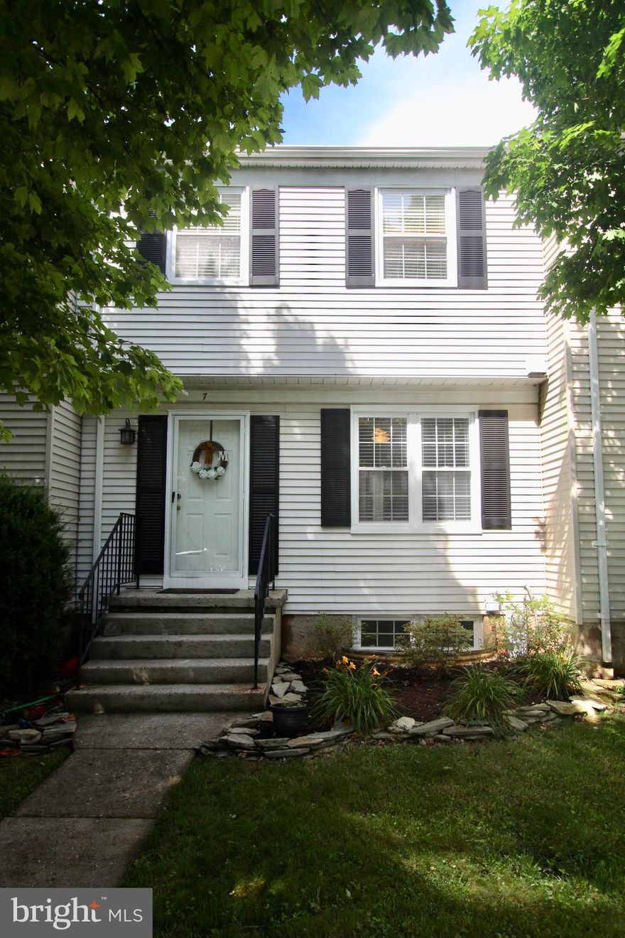 This is SUCH a great 4 BEDROOM and 2.5 Bath Townhome in a wonderful and peaceful setting and ready for you to move right in! Kitchen  with gorgeous Cabinets and Powder Room remodel in 2018!   BRAND NEW Carpet on Main and Upstairs Levels!  Freshly Painted! Spacious & charming 3-fully finished level townhome! NEW HVAC 2016! NEW Basement Sliding Door, Basement Windows & Solar Attic Fan in 2014!  NEW Hot Water Heater 2017! NEW Fridge, Dishwasher, Washer, Dryer in 2017! NEW Roof 2019! Ceiling Fans in all upstairs bedrooms. Huge Bright & Sunny Living Room & Kitchen! Large walk-out basement. Convenient to shopping malls & major routes! Walk to 2015 National Blue Ribbon Elementary School & Middle School!