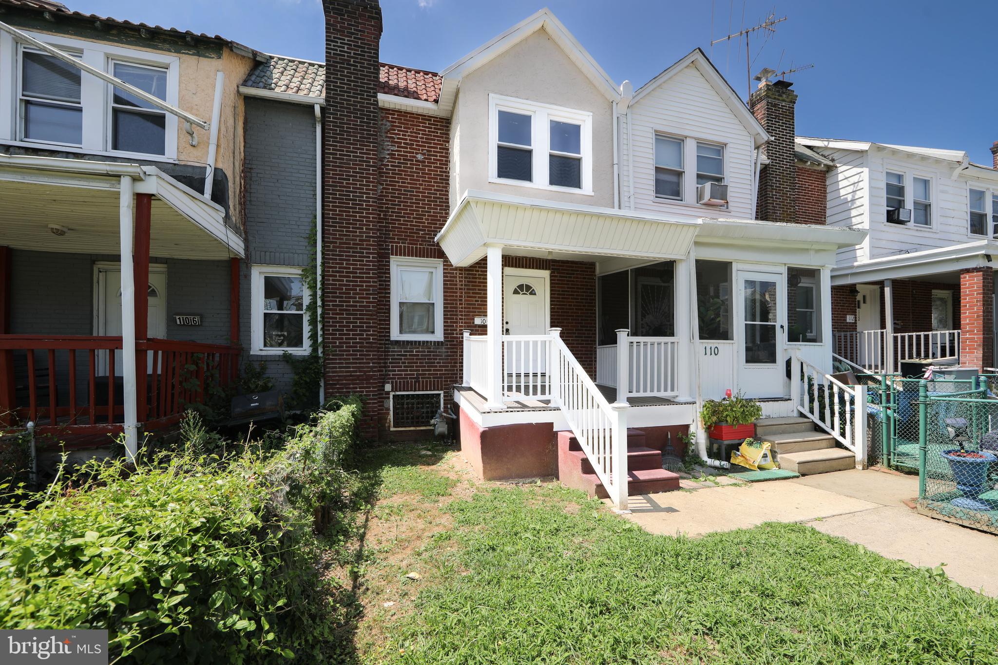Welcome to this beautifully rehabbed 3-bedroom, 1-bathroom row home in the Darby section of Delaware County. A welcoming front porch leads you inside, where new vinyl flooring flows throughout the first level, accented by crown molding and a charming decorative fireplace in the living room. The dining area opens to a spacious kitchen featuring a tasteful wooden island, brand-new custom cabinetry, and access to a small deck perfect for grilling or relaxing. Upstairs, you’ll find three generously sized bedrooms and a fully renovated bathroom with stunning floor-to-ceiling custom tile. The clean basement offers the potential to be easily finished for additional living space, and the garage provides even more room if desired. Conveniently located near public transportation and shopping, this move-in-ready gem is one you won’t want to miss—schedule your showing today!