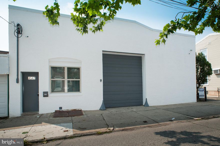 Immaculate 3760 sq.ft. warehouse located on a prime residential block in charming Bridesburg just off 95, zoned and permitted for auto-repair. Included is an air compressor and water heater. This warehouse has all recent plumbing (inside and the main from the street) and electric (service and wiring), both done with proper permits. The owner put on a rubber roof down to all new framing and installed a 6 camera monitoring system. The front of building has a waiting area with half bath and a back office area. There is a tall electric roll-up door from the street, as well as an entry door next to it. The shop has a large utility bathroom. There is also a small basement (not included in square footage that contains the electric water heater and an air compressor). Zoning variance is for: "personal vehicle maintenance and repair with accessory office on the first floor. (no body or fender work.)"