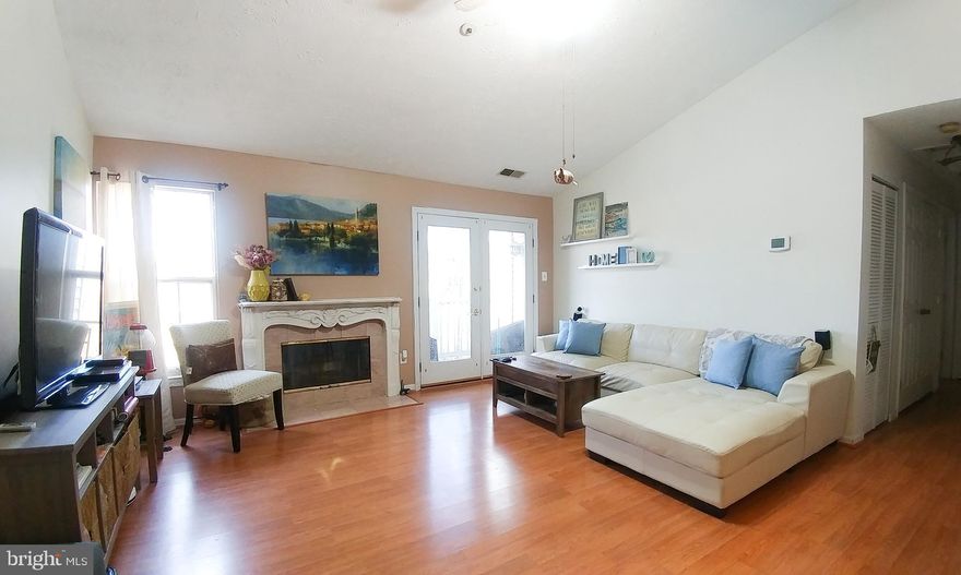 Check out this captivating contemporary penthouse condo with soaring cathedral ceilings! Lots of windows with so much natural light! Fabulous fireplace in the living room with a custom mantel and a marble surround. Upgrades throughout including the kitchen, bath, and flooring! French doors in the living room lead to deck with private wooded views! Low maintenance ceramic tile in kitchen and bath! Bath has a whirlpool tub! The kitchen has new granite counter-tops and even a breakfast bar! Not to mention a full sized washer and dryer! All appliances convey! This is also FHA approved. The HOA has scheduled this building for new siding and a new roof this month! FHA approved!